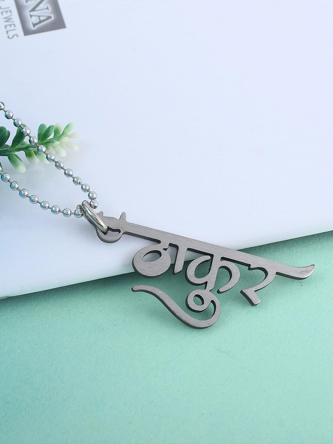 

MEMOIR Unisex Stainless Steel Laser Carved Thakur Pendant With Chain, Silver