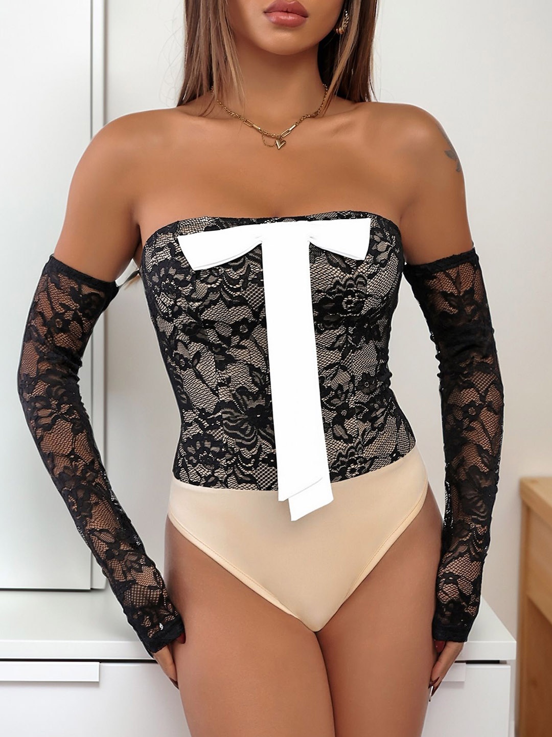 

StyleCast Women Printed Strapless Neck Bodysuit, Black