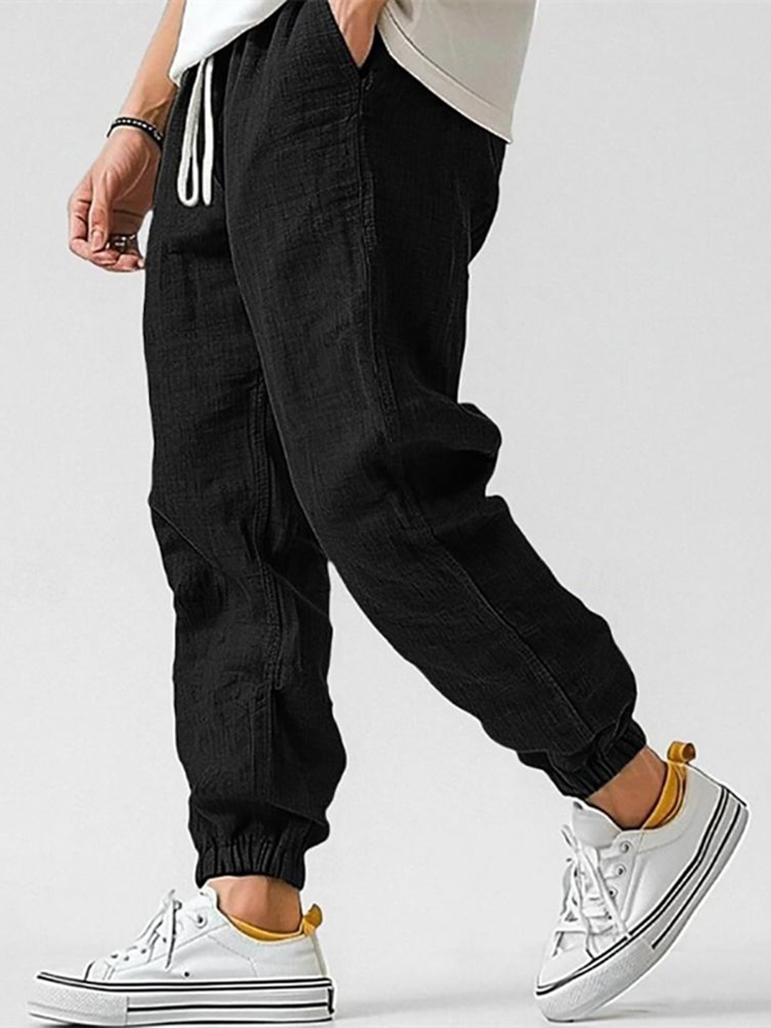 

StyleCast x Revolte Men Mid-Rise Easy Wash Regular Fit Cotton Joggers, Black