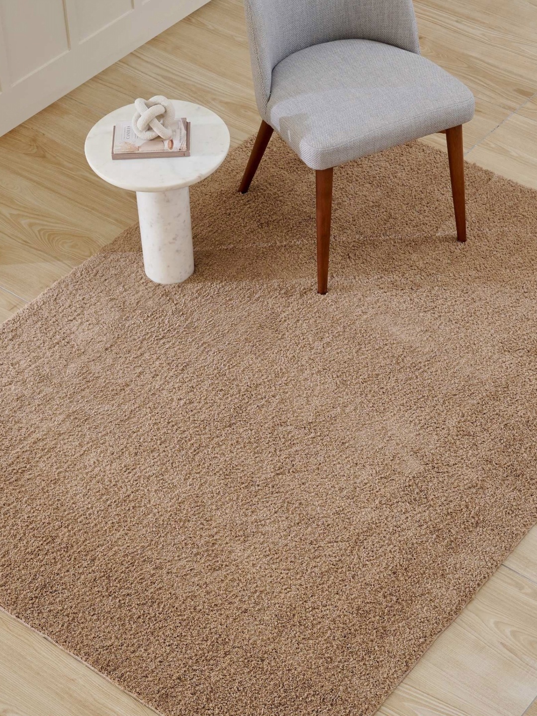 

Home Centre Beige Rectangle Shaped Tufted Carpet