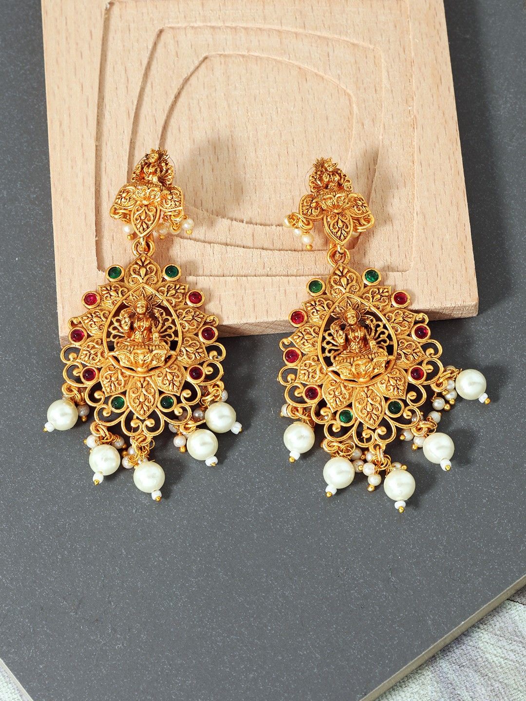 

Anouk Green Gold-Plated Goddess Laxmi Artificial Beads Studded Teardrop Shaped Earrings