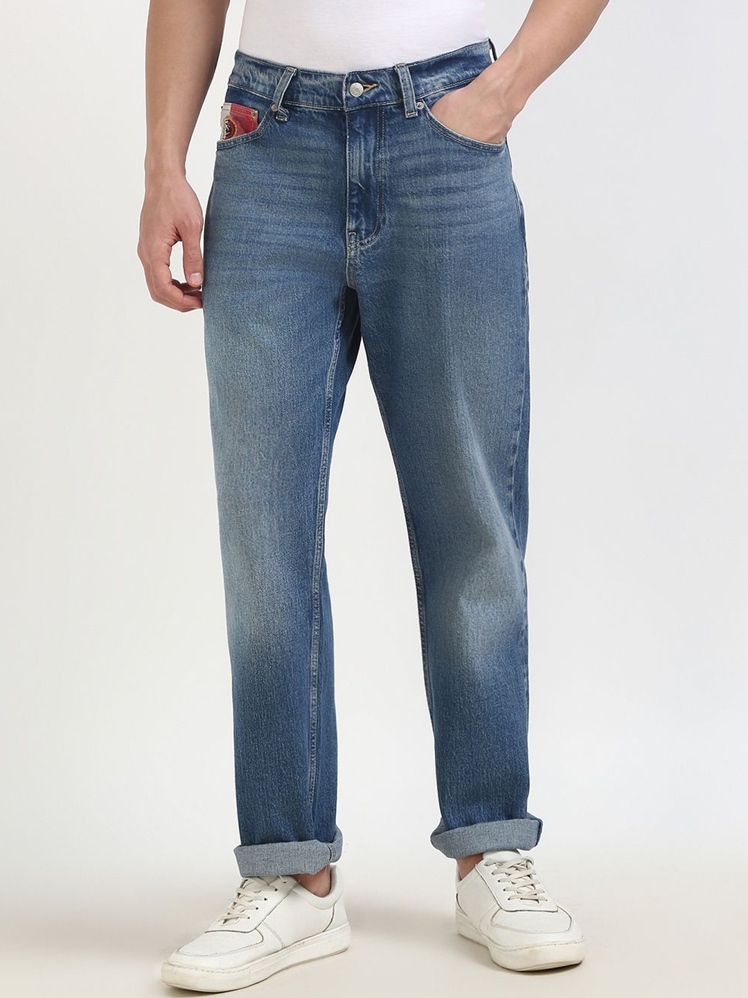 

Tommy Hilfiger Men Slim Fit Light Fade Cotton Jeans, Blue