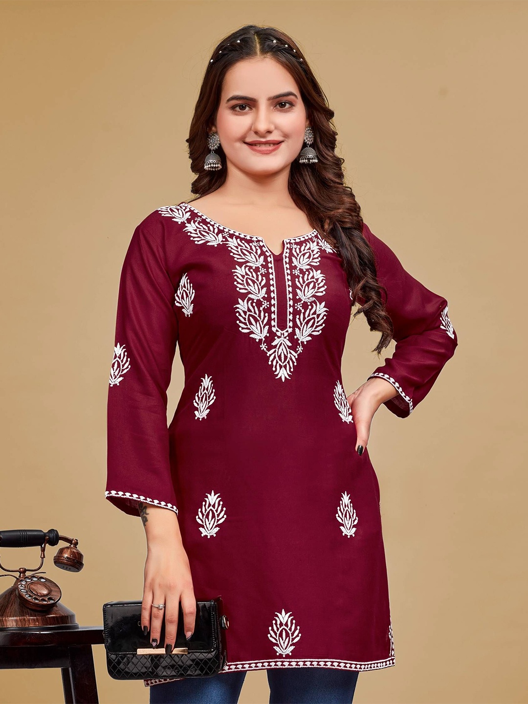 

Kalavrund Creation Ethnic Motifs Embroidered Chikankari Kurti, Maroon
