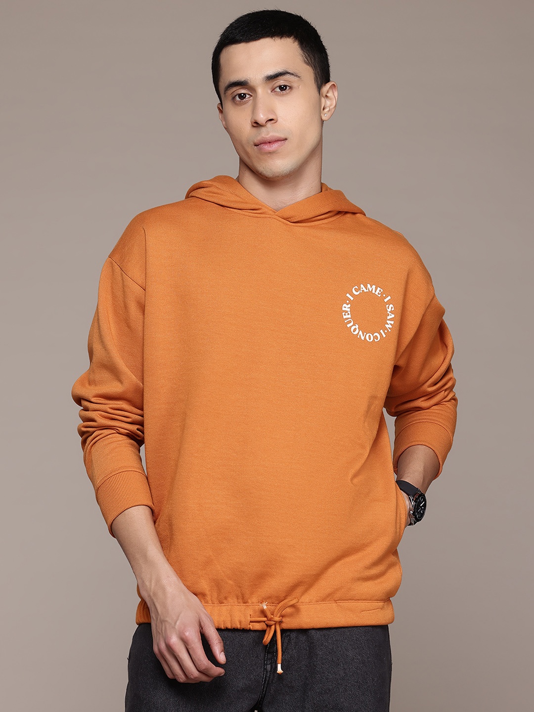 

The Roadster Lifestyle Co. Men Printed Hooded Pure Cotton Sweatshirt, Orange