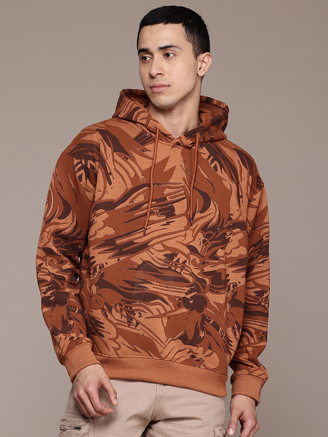 

The Roadster Lifestyle Co. Men Printed Hooded Pure Cotton Sweatshirt, Tan