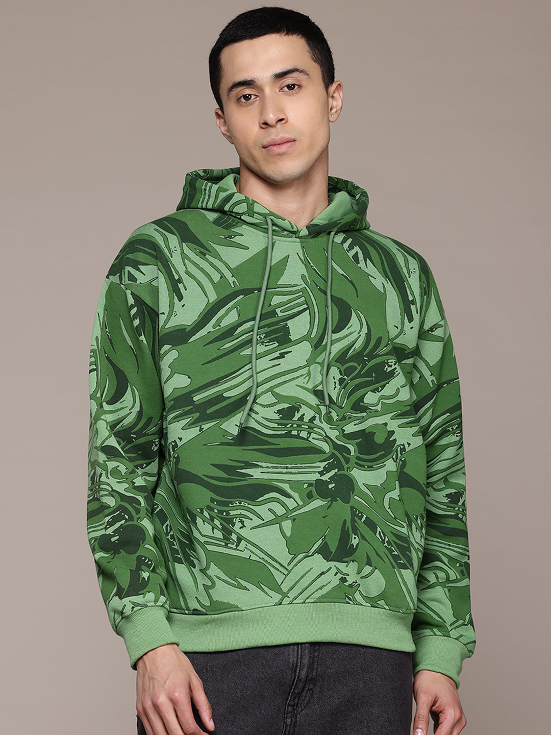 

The Roadster Lifestyle Co. Men Printed Hooded Pure Cotton Sweatshirt, Green