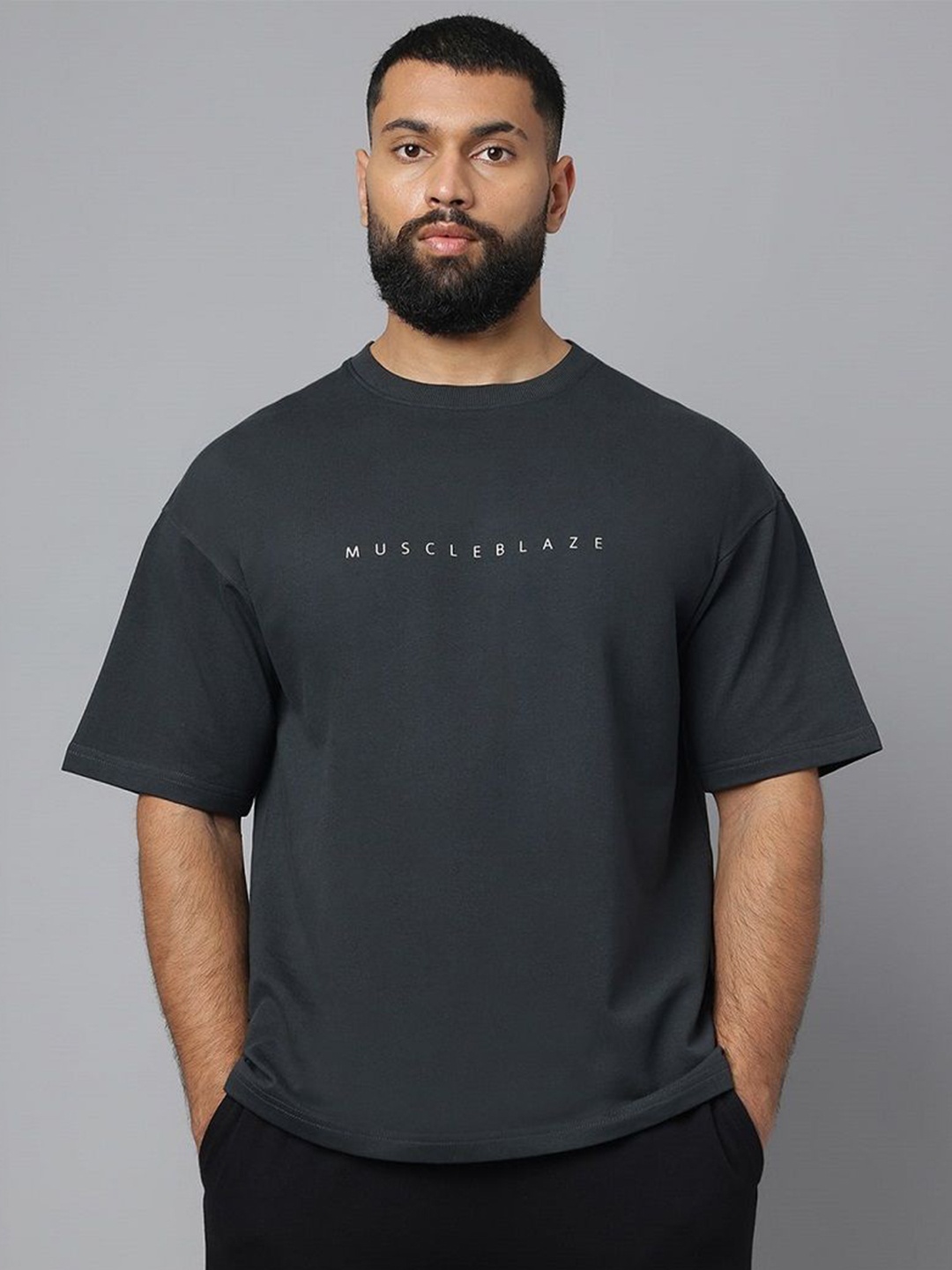 

MuscleBlaze Unisex Typography Printed Round Neck Cotton Relaxed Fit T-shirt, Charcoal