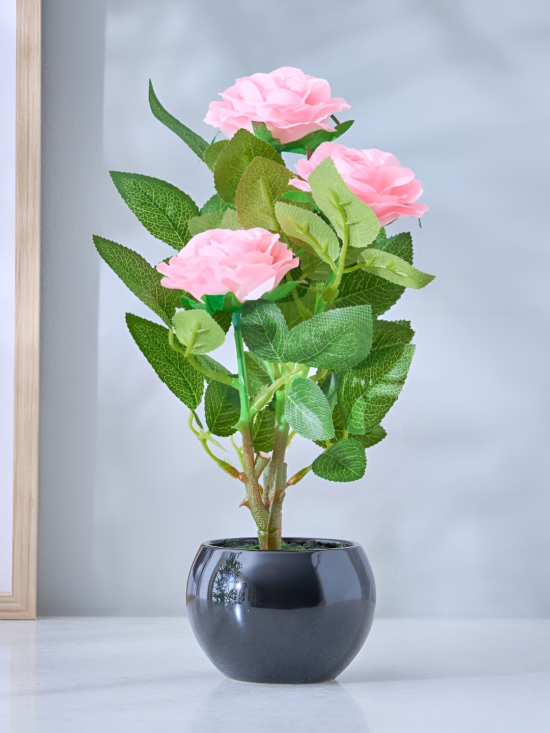 

Home Centre Gloria Scapes Pink & Green Pieces Rose Artificial Flower With Pot