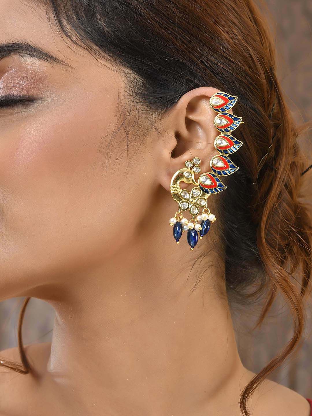 

Voylla Gold Plated Kundan Studded Peacock Shaped Enamelled Ear Cuff Earrings