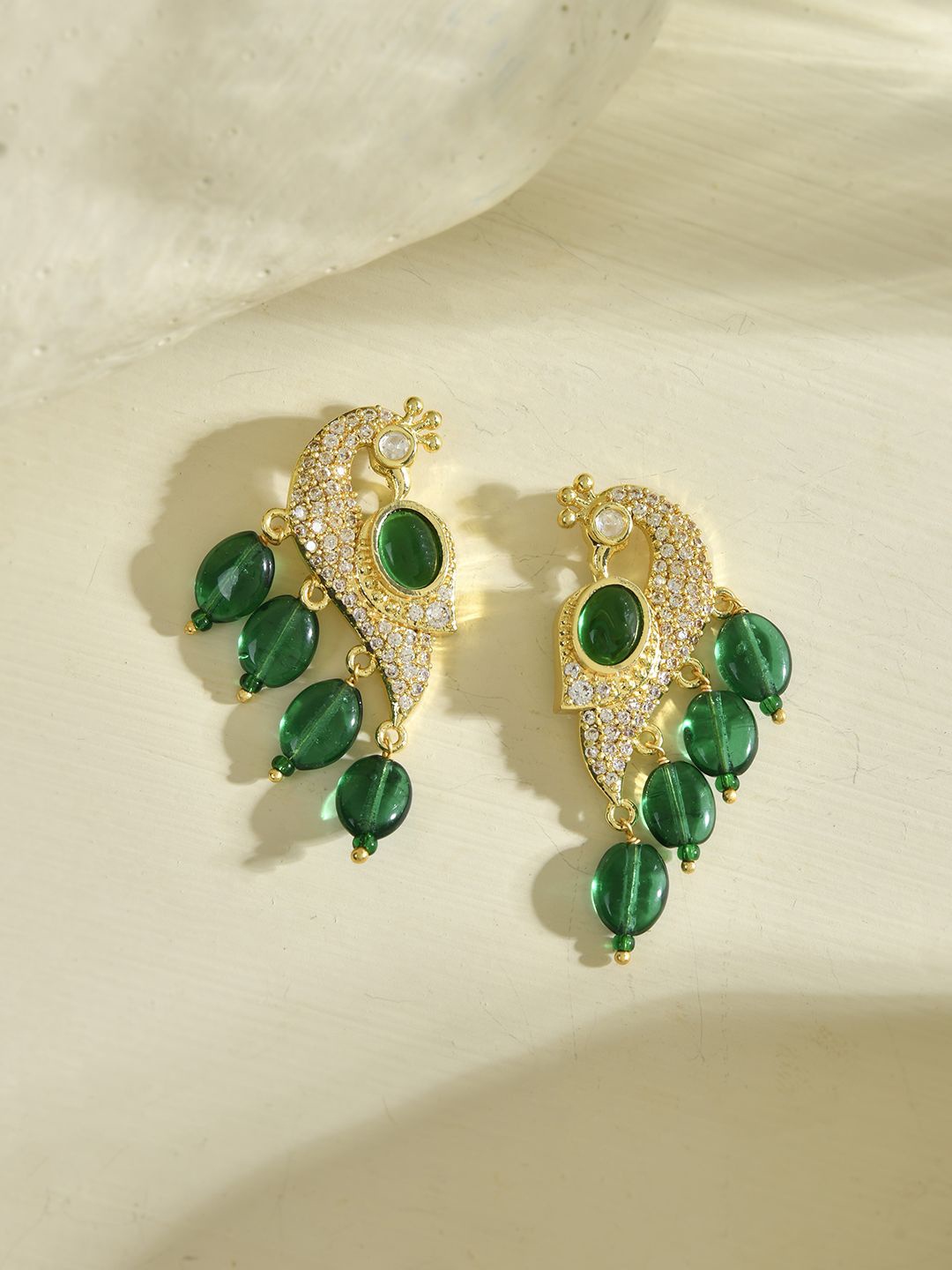 

Voylla Gold Plated Kundan Studded Peacock Shaped Drop Earrings