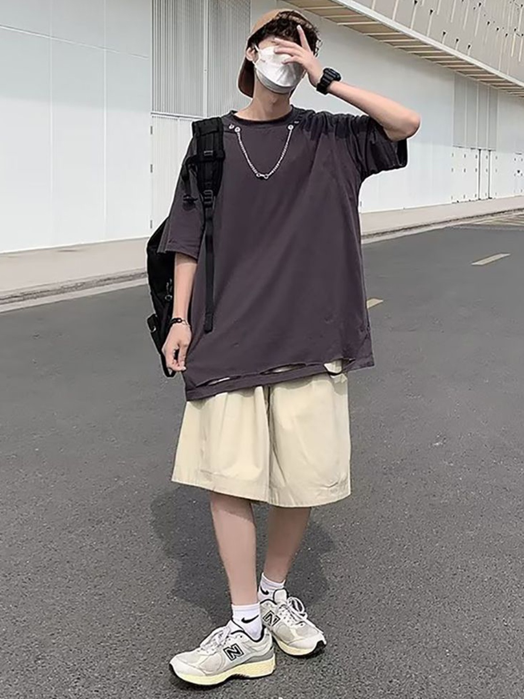 

StyleCast x Revolte Men Solid Round Neck Oversized T-shirt, Brown