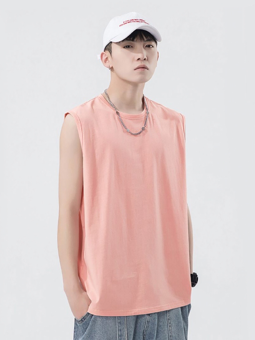 

StyleCast x Revolte Men Solid Round Neck Cotton T-shirt, Peach