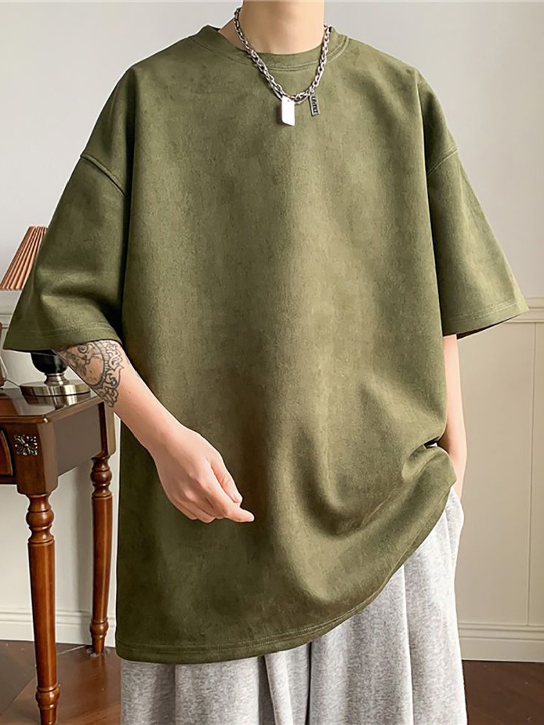 

StyleCast x Revolte Men Solid Round Neck Oversized T-shirt, Olive