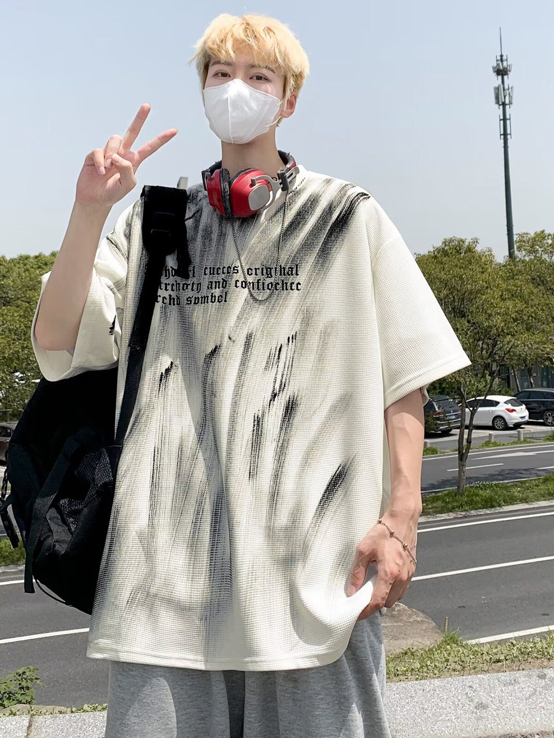 

StyleCast x Revolte Men Typography Printed Round Neck Oversized T-shirt, Off white