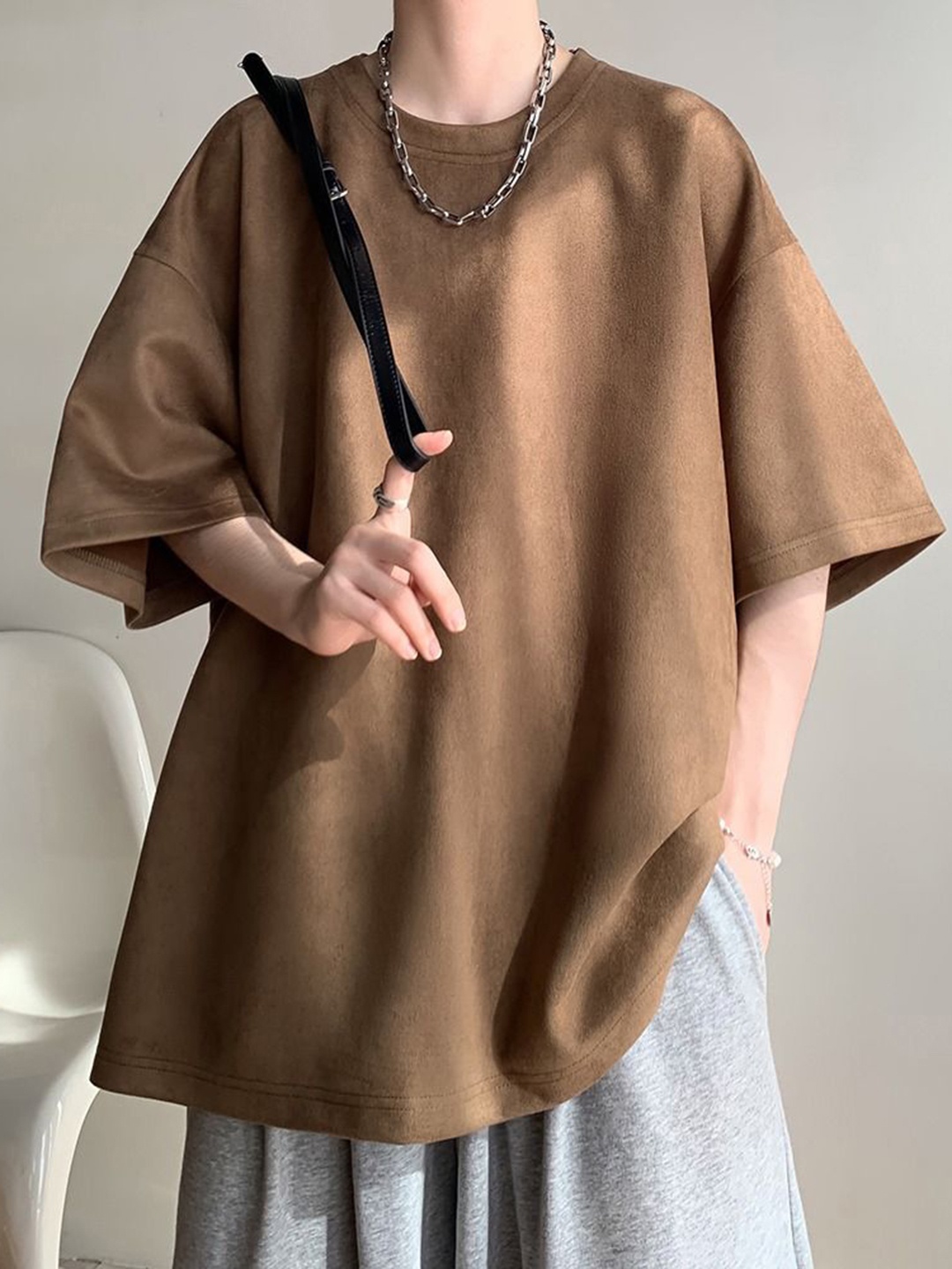 

StyleCast x Revolte Men Solid Round Neck Oversized T-shirt, Brown