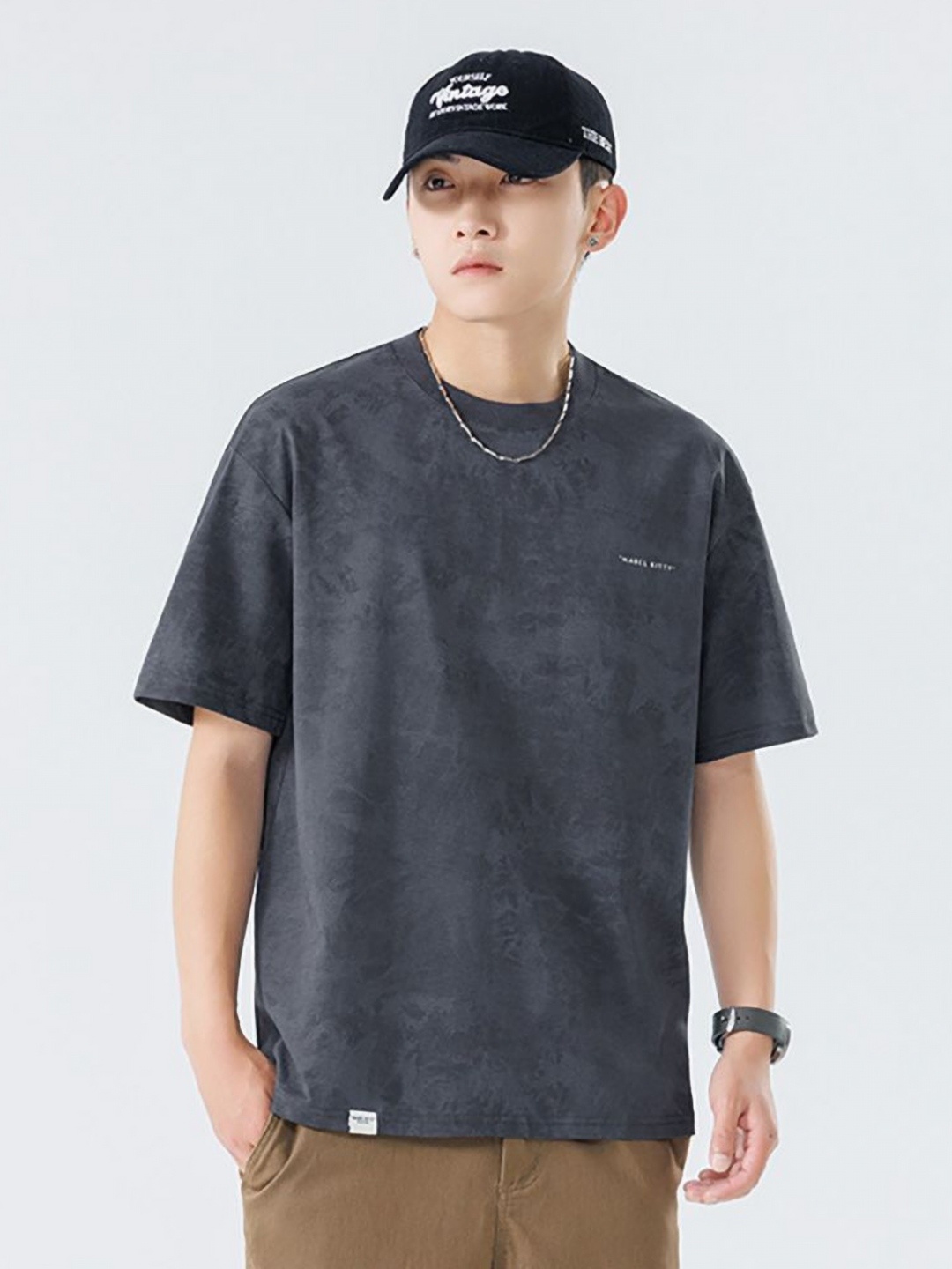 

StyleCast x Revolte Men Solid Round Neck Cotton Relaxed Fit T-shirt, Grey