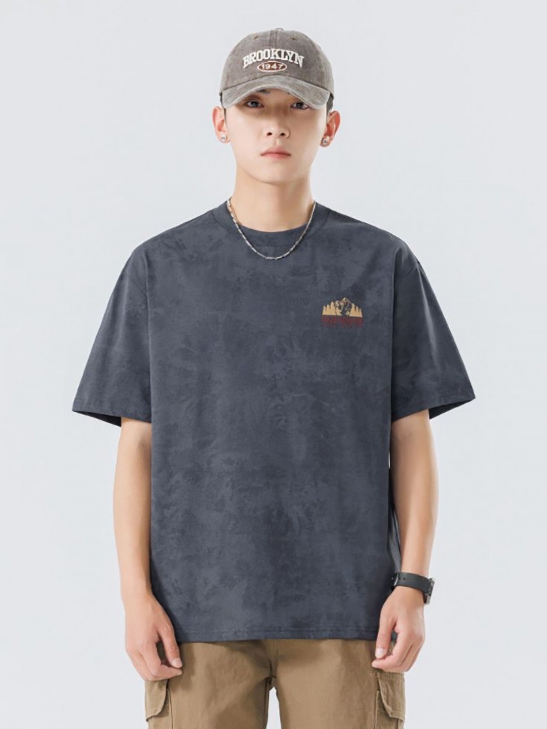

StyleCast x Revolte Men Graphic Printed Round Neck Cotton Relaxed Fit T-shirt, Grey
