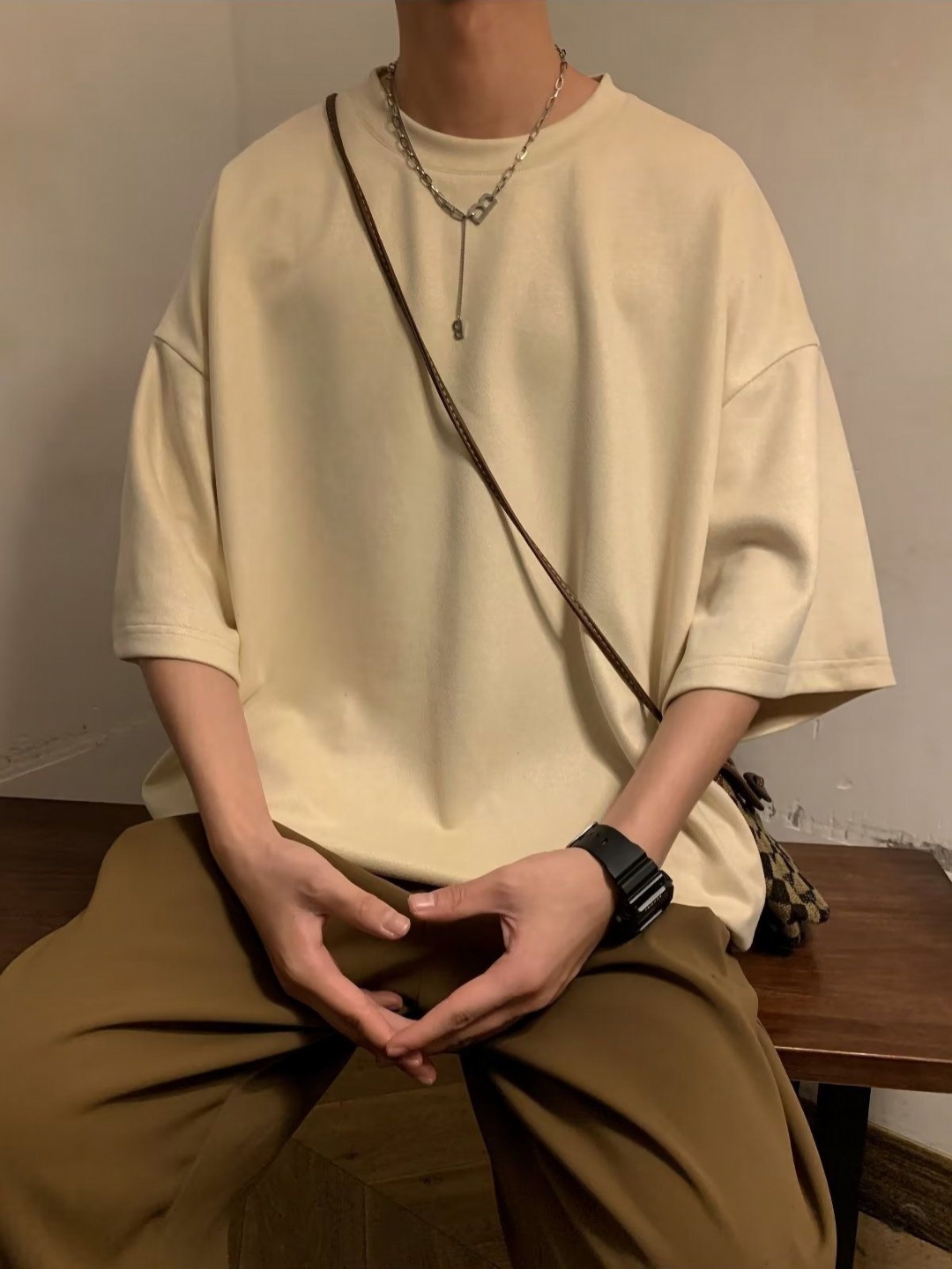 

StyleCast x Revolte Men Solid Round Neck Oversized T-shirt, Beige