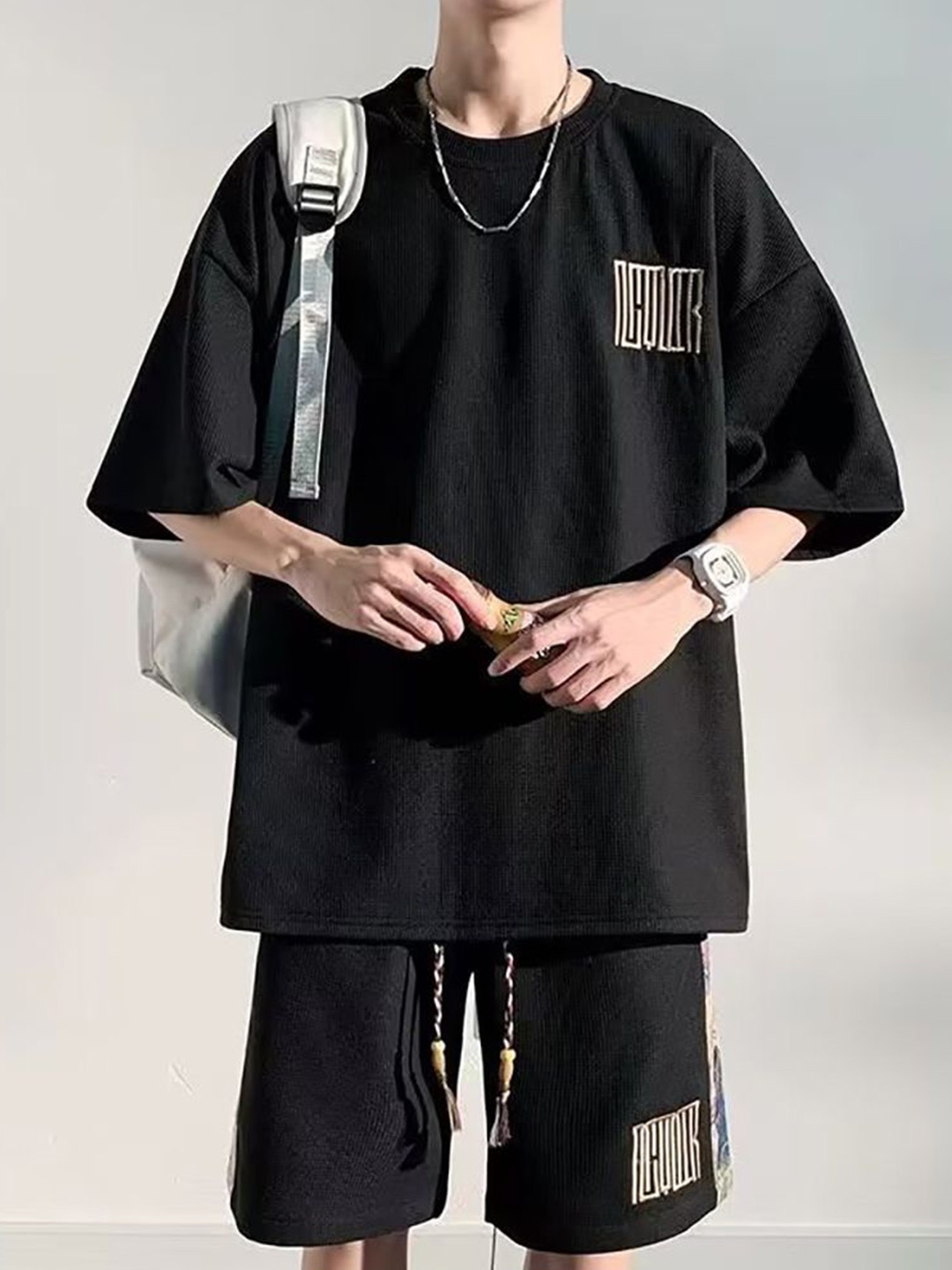 

StyleCast x Revolte Round Neck Printed T-shirt With Shorts, Black