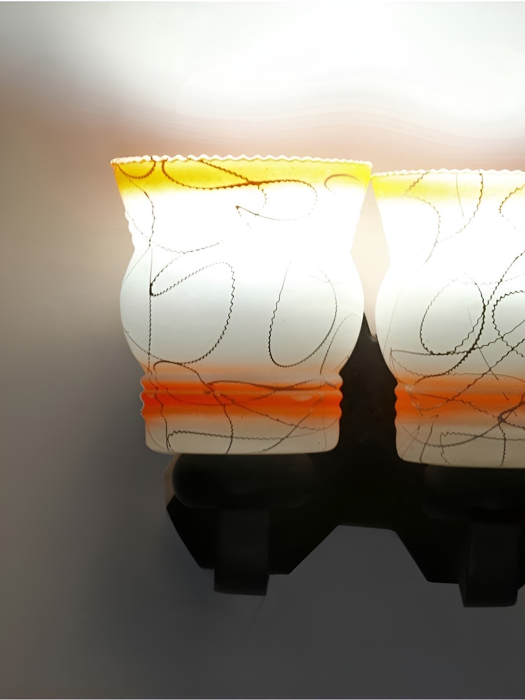 

Afast Orange Colored & White Printed Wood Wall Lamp