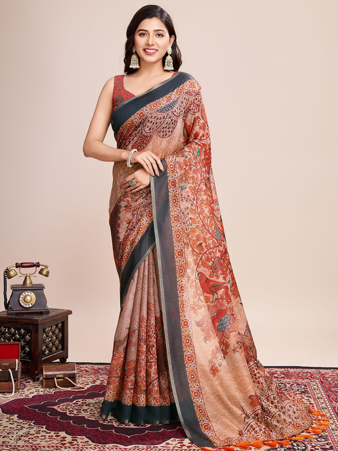 

Mitera Ethnic Motifs Printed Saree With Unstitched Blouse Piece, Orange