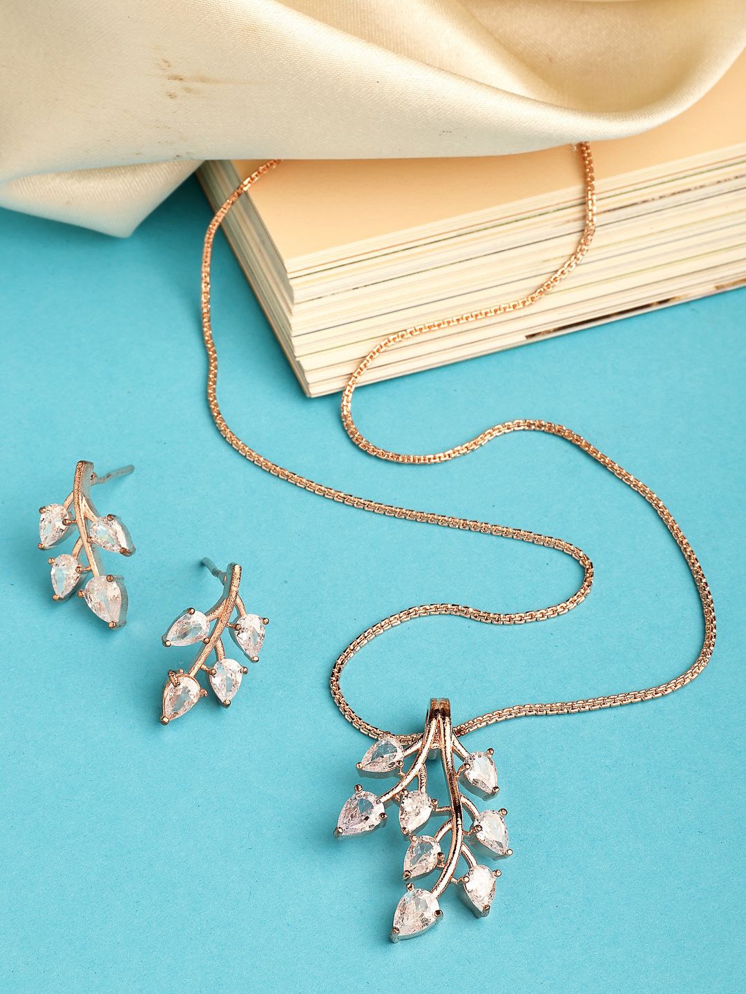 

ZENEME Rhodium Plated Shimmery Rose Gold Leaf Pendant & Earring Set