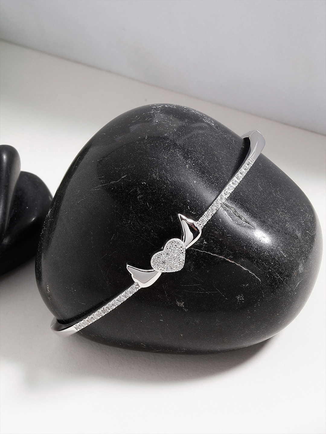 

DIAVO Cubic Zirconia Winged Heart Silver Bangle-Style Bracelet