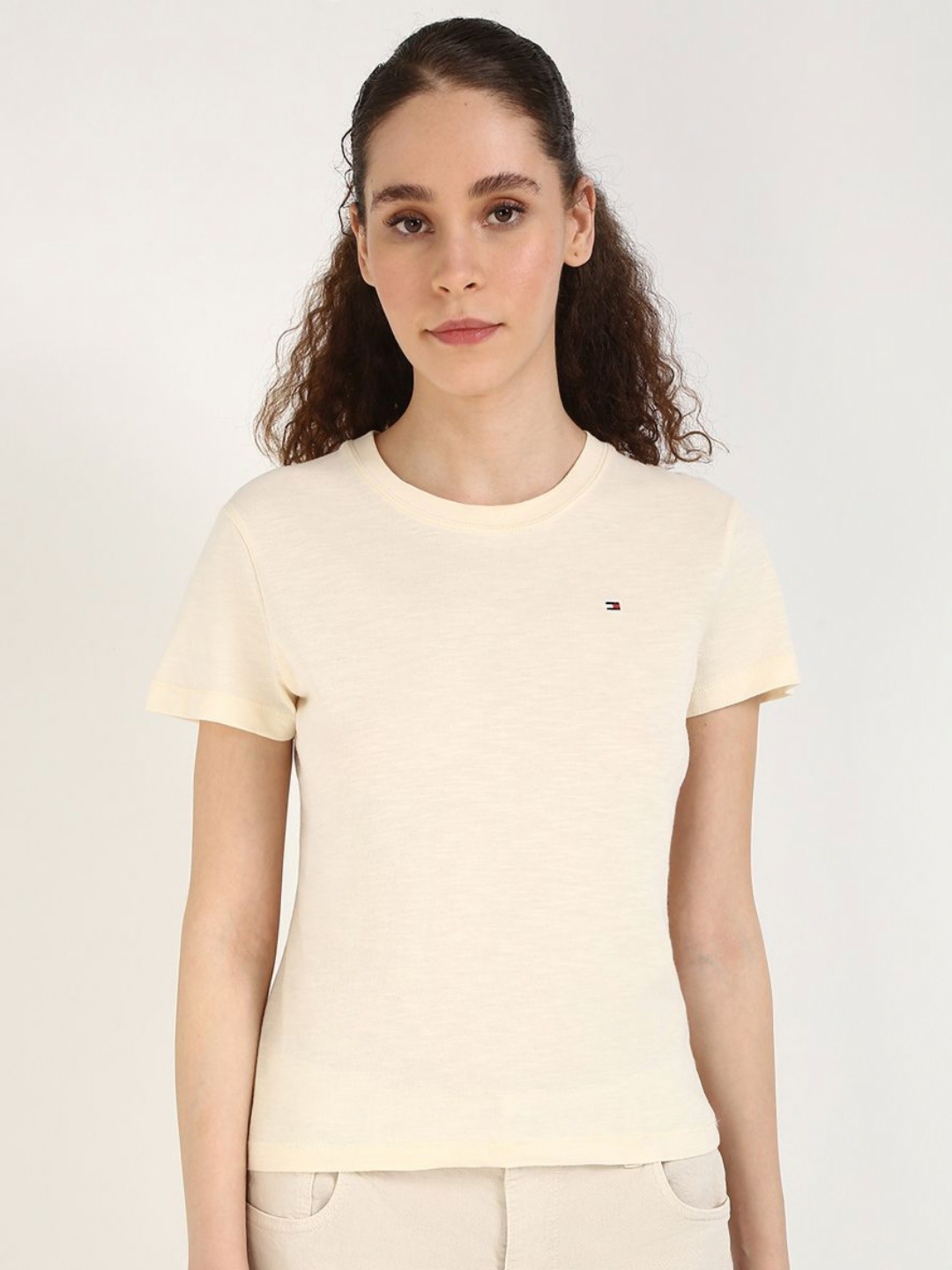 

Tommy Hilfiger Women Solid Round Neck Cotton T-shirt, Beige