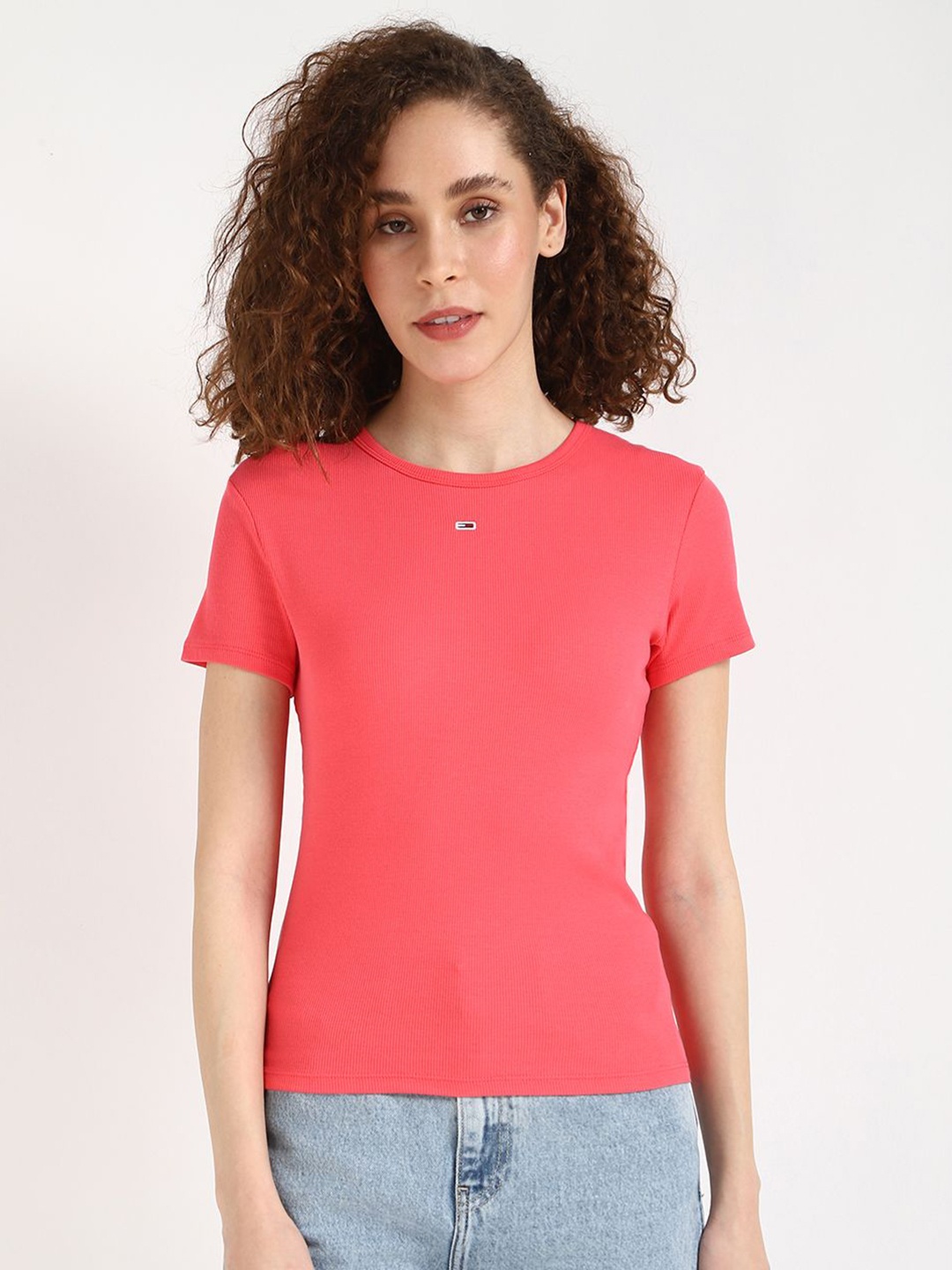 

Tommy Hilfiger Women Solid Round Neck Cotton T-shirt, Coral