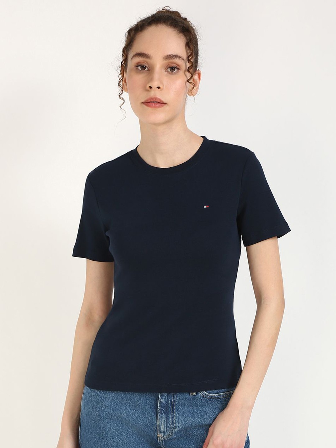 

Tommy Hilfiger Women Solid Round Neck Cotton T-shirt, Black