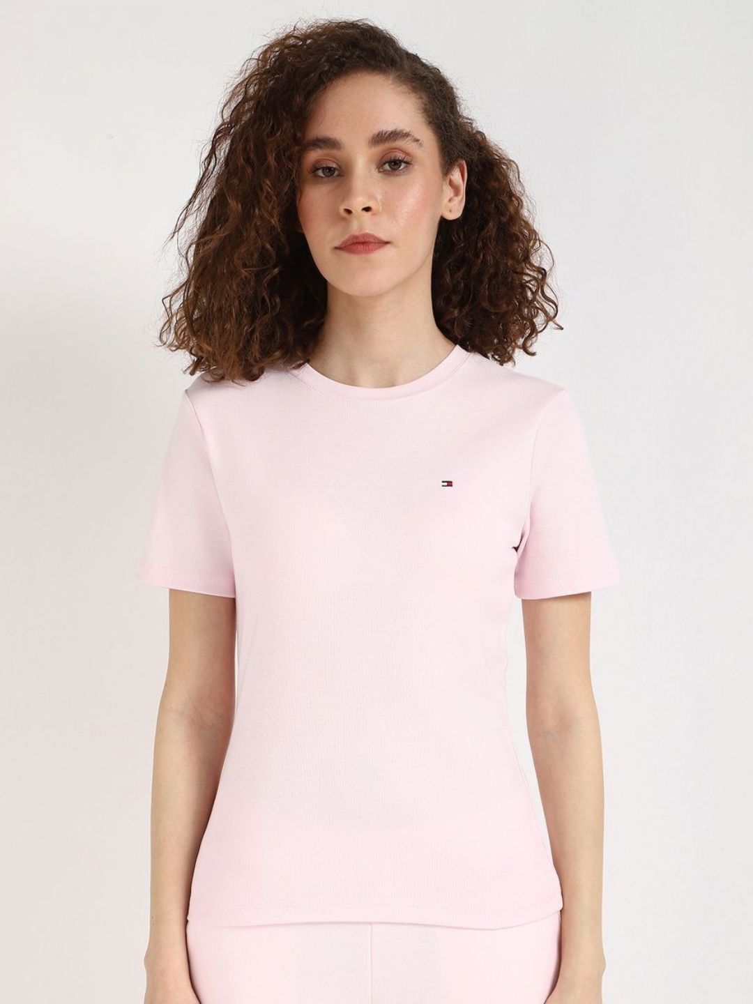 

Tommy Hilfiger Women Solid Round Neck Cotton T-shirt, Pink