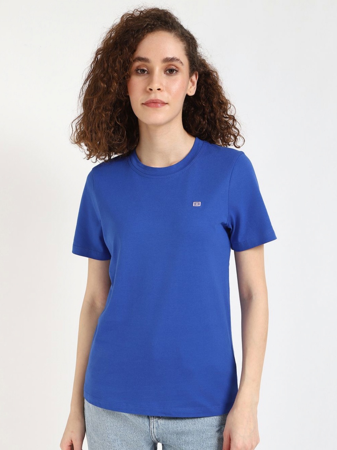 

Tommy Hilfiger Women Solid Round Neck Cotton T-shirt, Blue