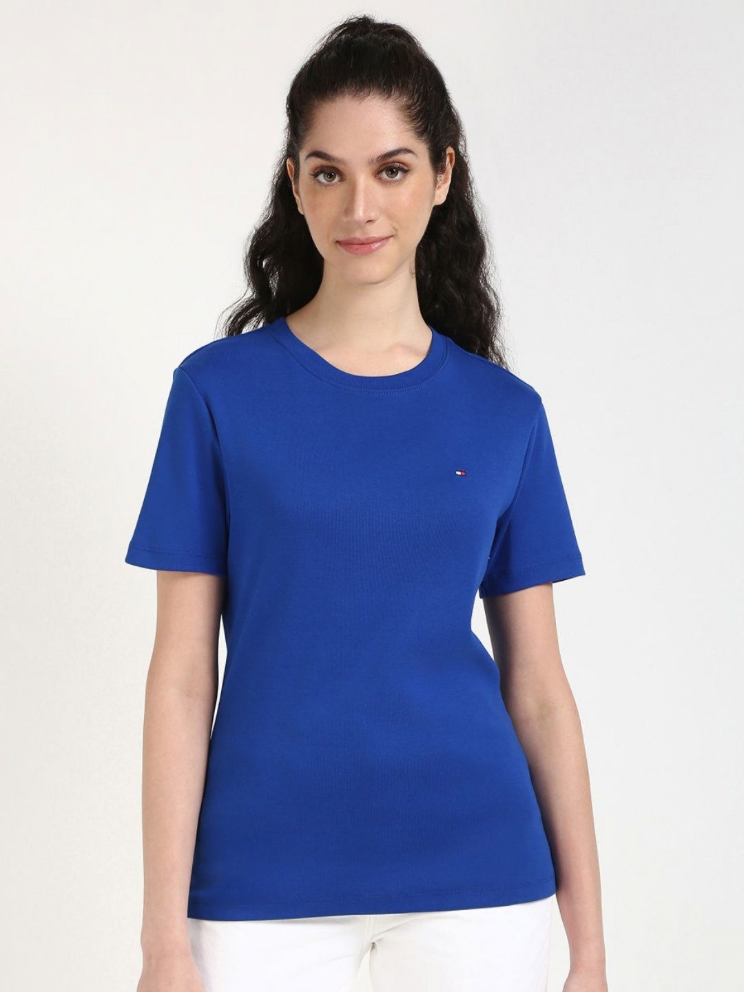 

Tommy Hilfiger Women Solid Round Neck Cotton T-shirt, Blue