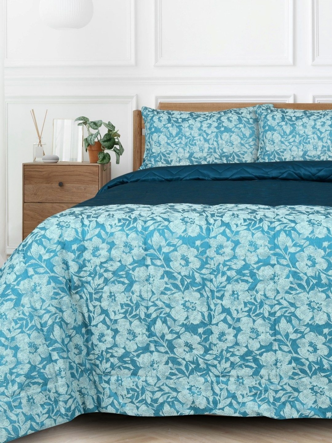 

Saral Home Teal & White Floral 400 GSM Single Bed Quilt