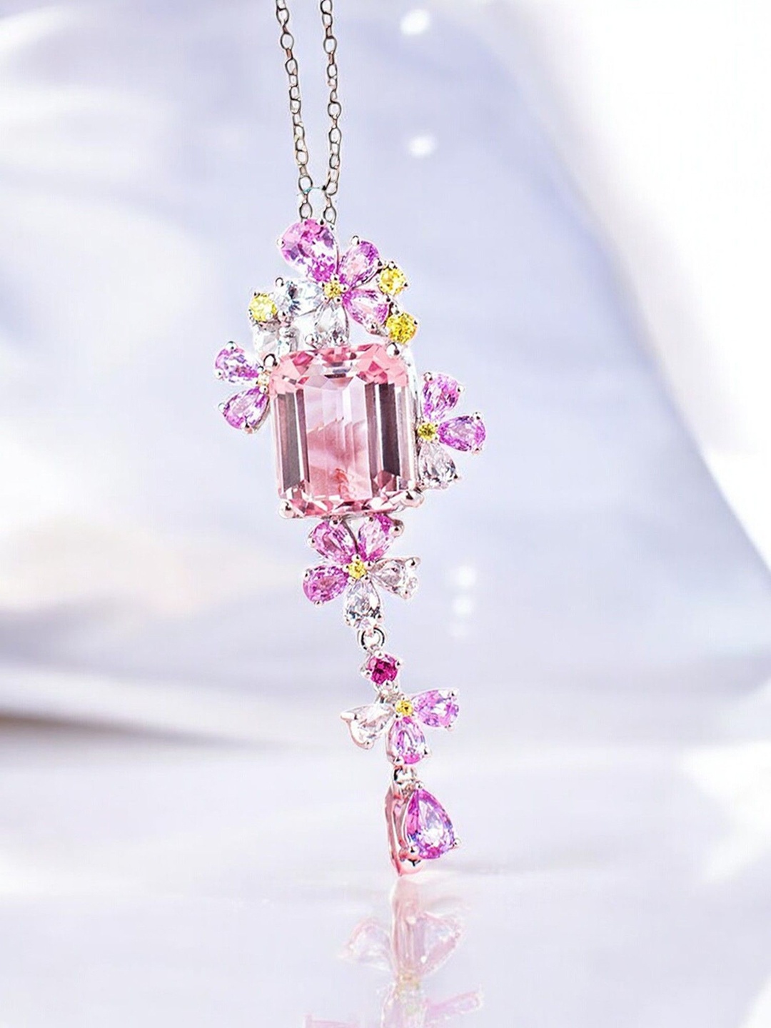 

Designs & You Silver Plated AD Studded Cubic Zirconia Pendant With Chain