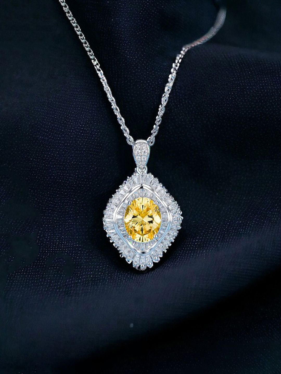 

Designs & You Silver Plated AD Studded Cubic Zirconia Pendant With Chain