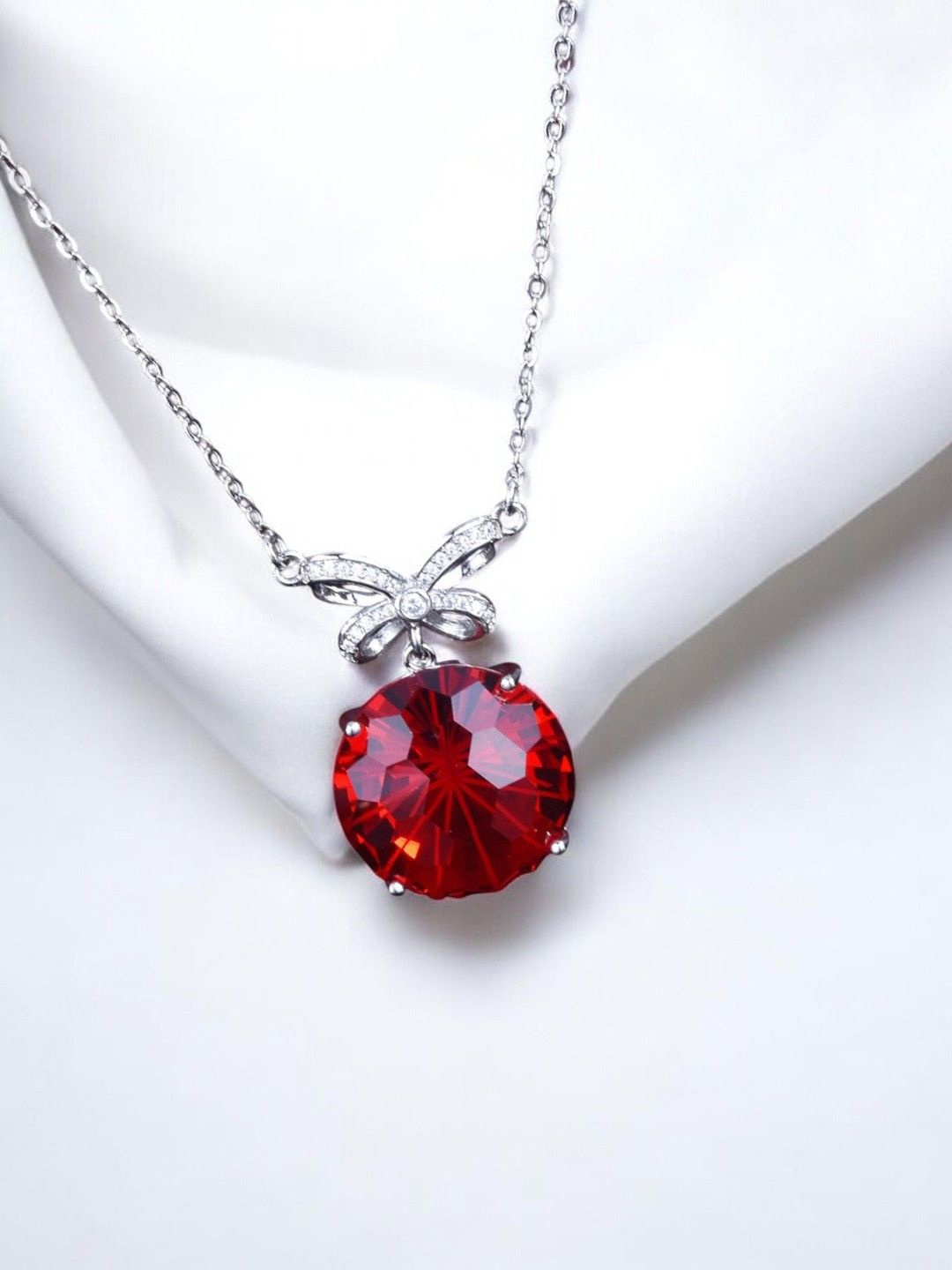 

Designs & You Silver Plated AD Studded & Cubic Zirconia Pendant With Chain