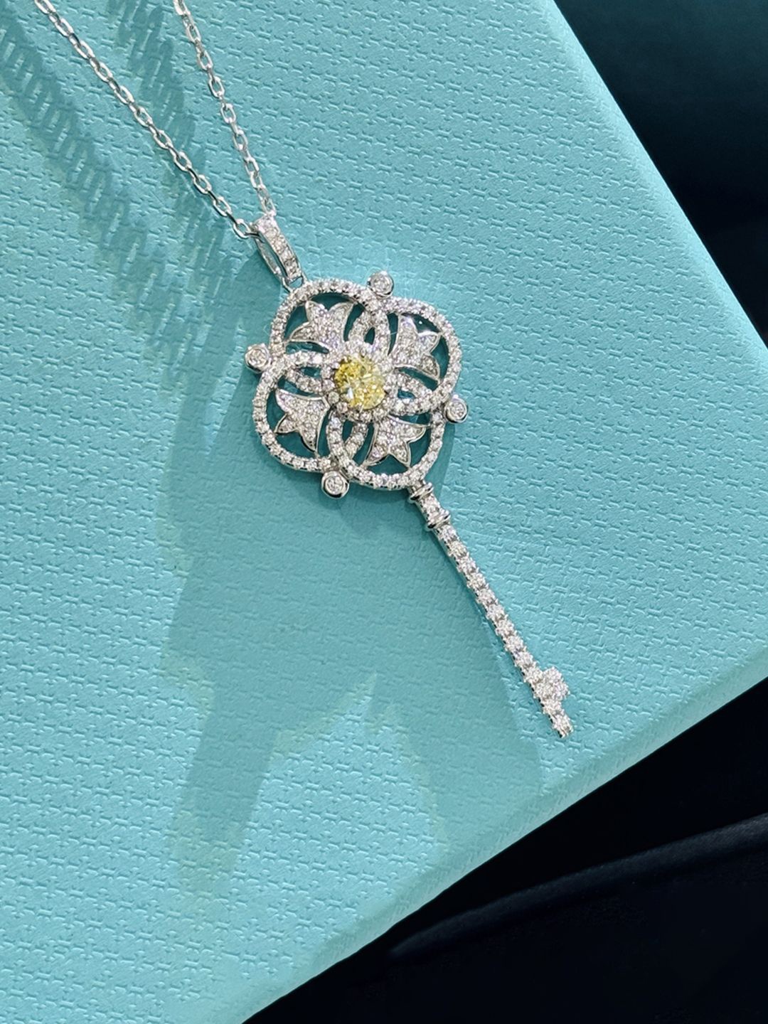 

Designs & You Silver-Plated American Diamond Studded Key Shaped Pendant Chain