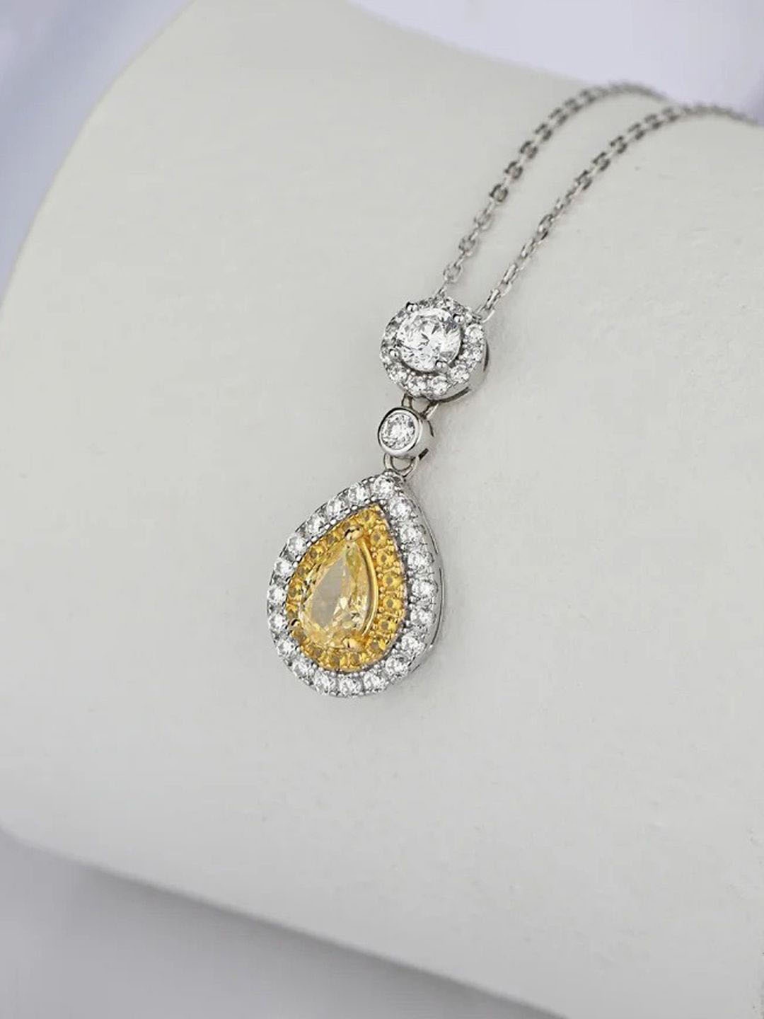 

Designs & You Silver-Plated American Diamond Studded Teardrop Shaped Pendant Chain