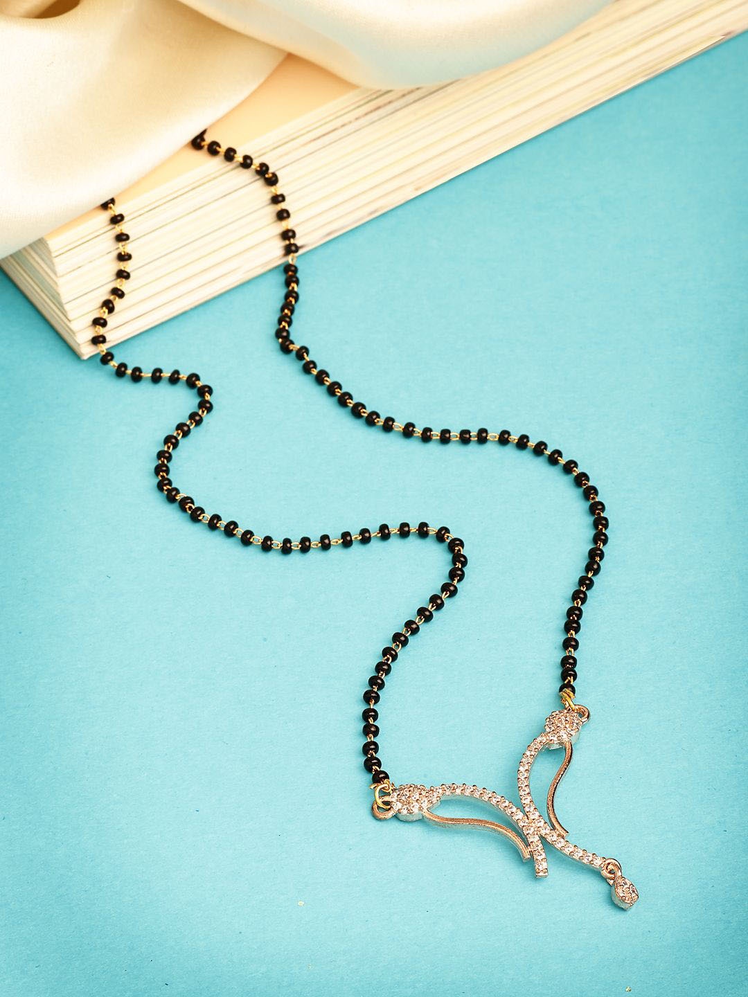 

ZENEME Rose Gold-Plated Black Beaded & Stone Studded Embellished Mangalsutra