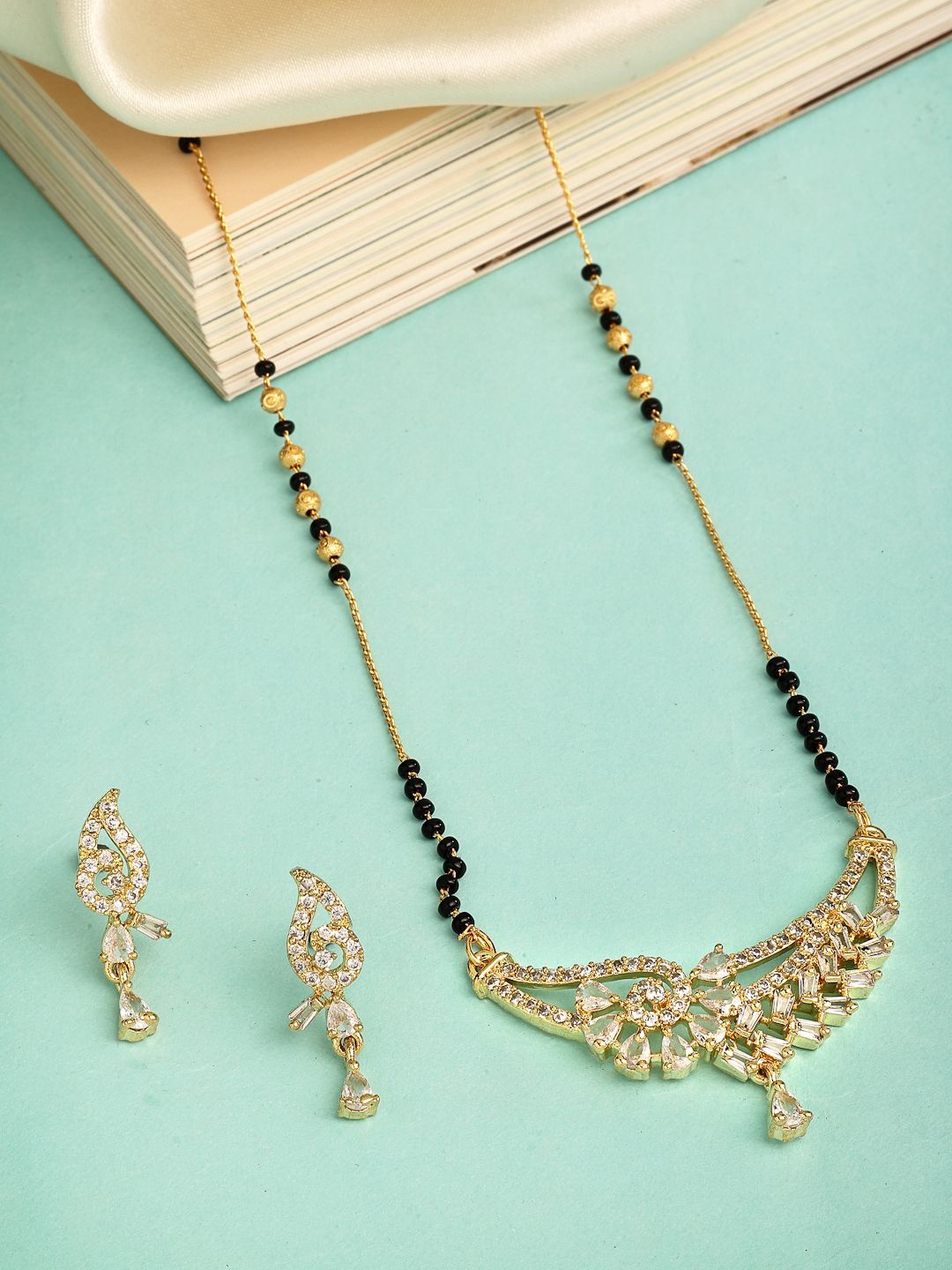 

ZENEME Gold-Plated Black Beaded & Stone Studded Mangalsutra Pendant with Chain & Earrings