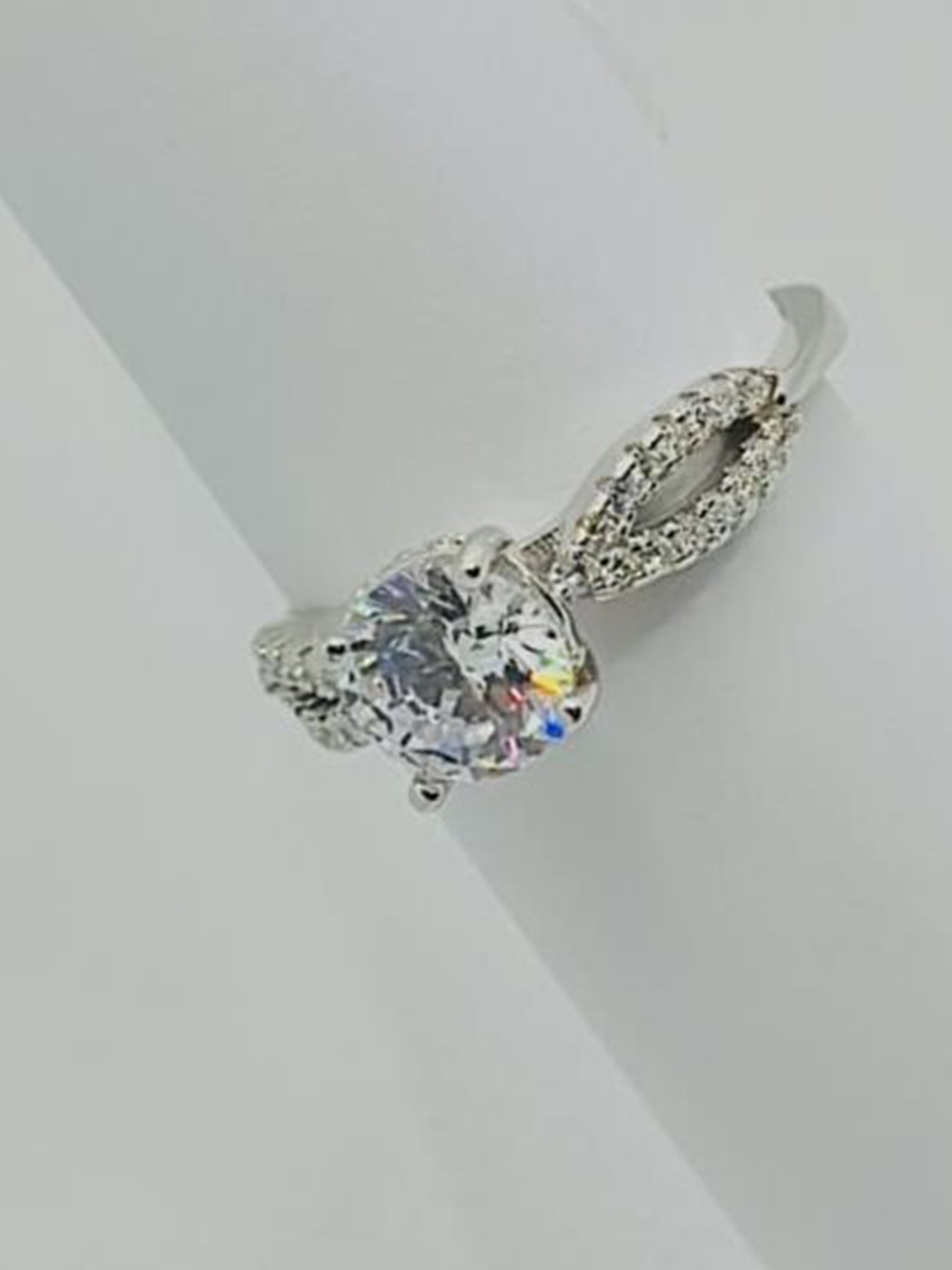 

Luxevogue Infinite Solitaire Sparkle 925 Sterling Silver Rhodium Plated CZ Studded Ring, White