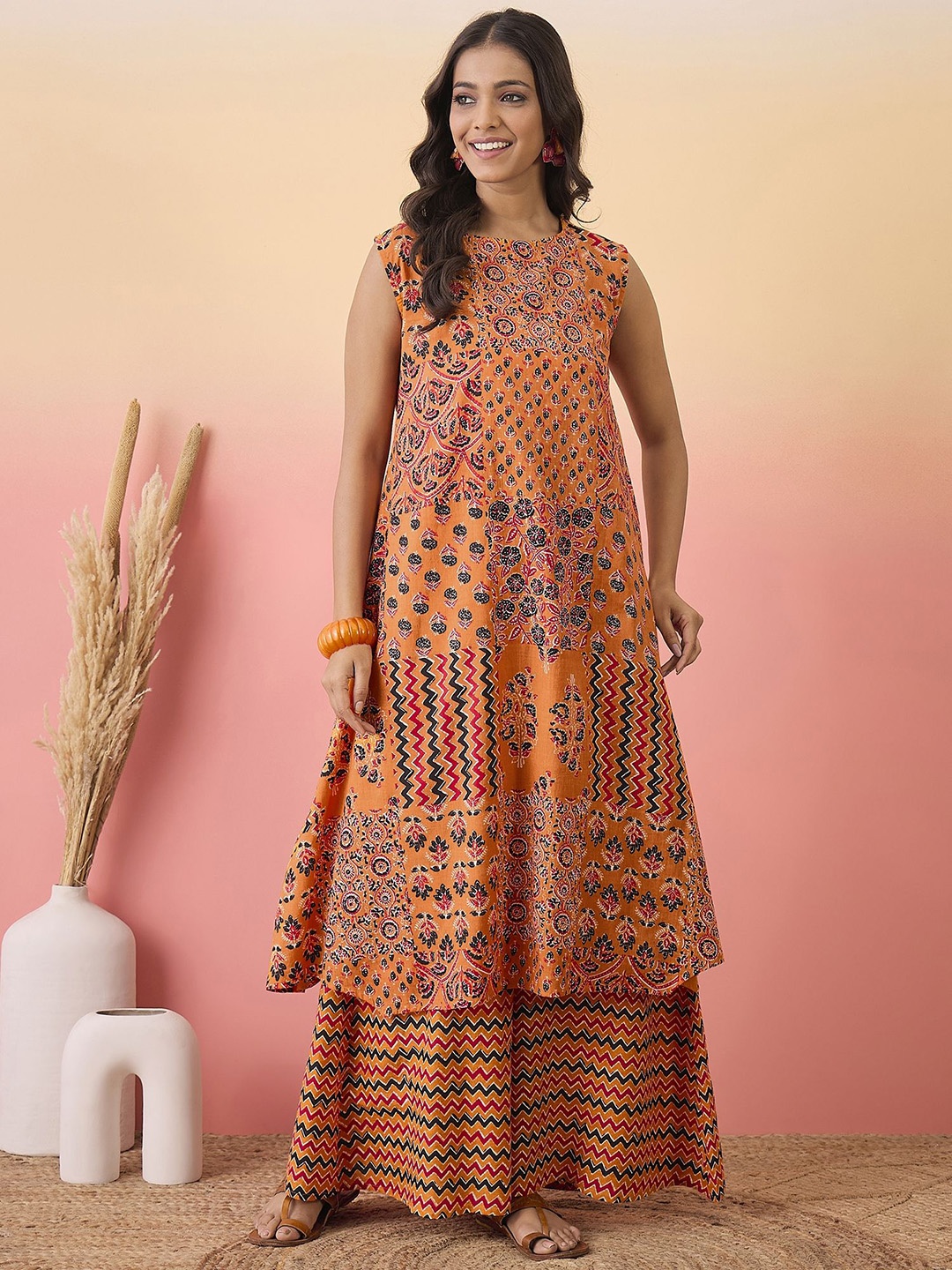 

Sangria Floral Printed Boat Neck A-Line Kurta and Palazzo, Orange