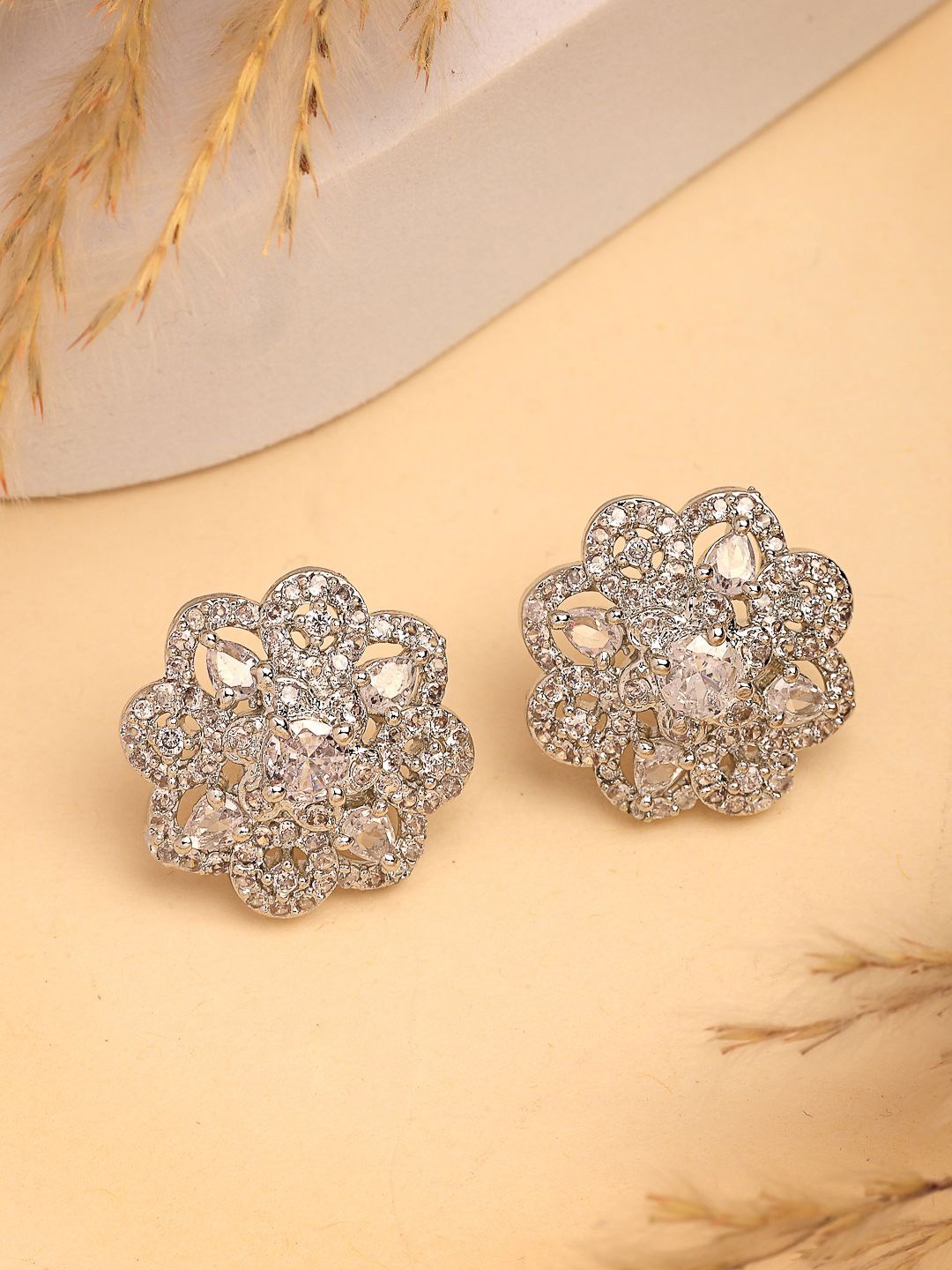 

NVR Women Silver-Plated AD- Studded Circular Shaped Studs Earring