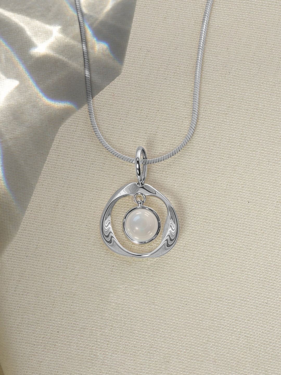 

HighSpark 925 Sterling Silver Rainbow Moonstone Infinite Mobius Charm Pendant With Chain