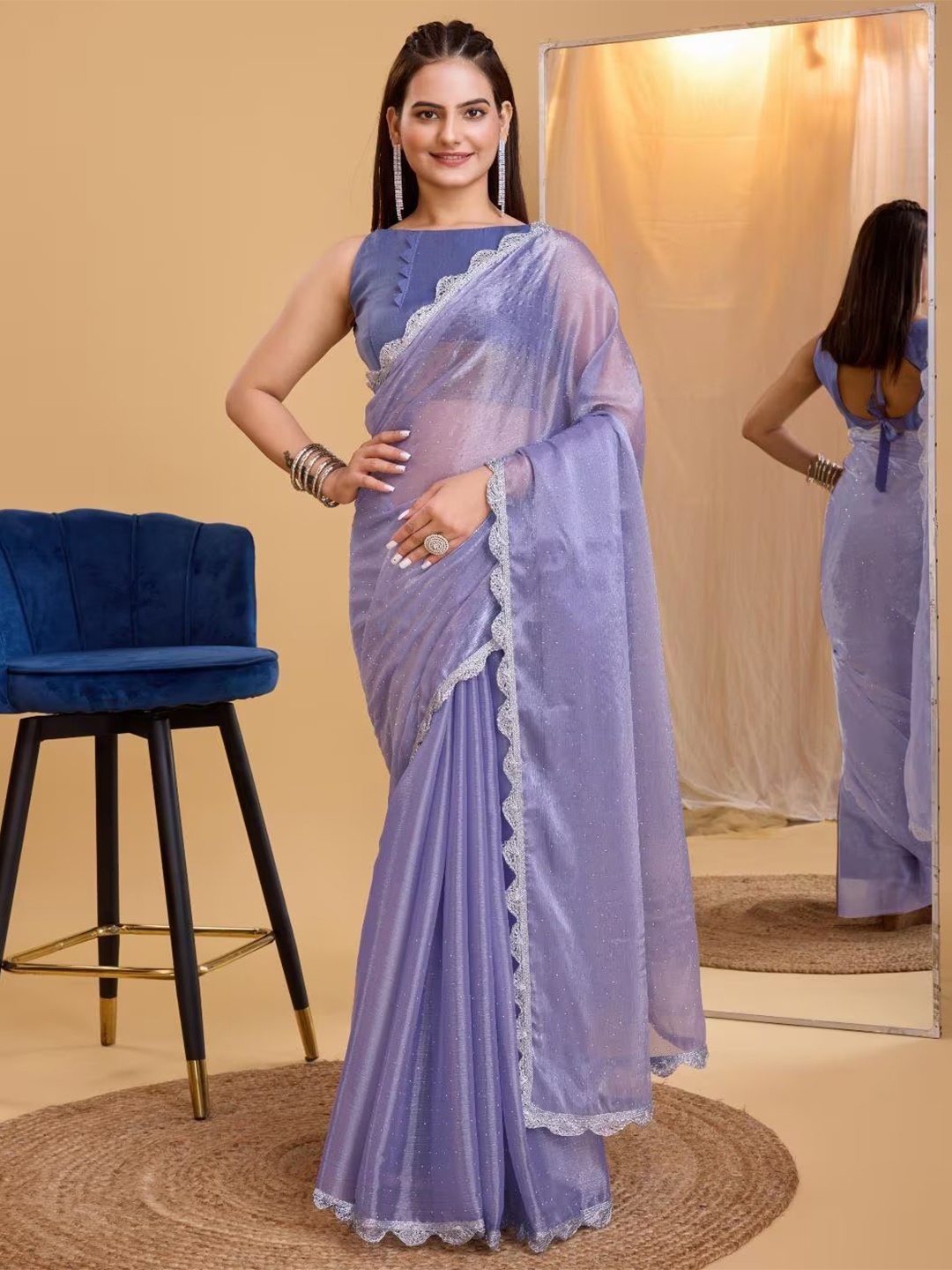 

APNISHA Embellished Embroidered Net Saree, Lavender