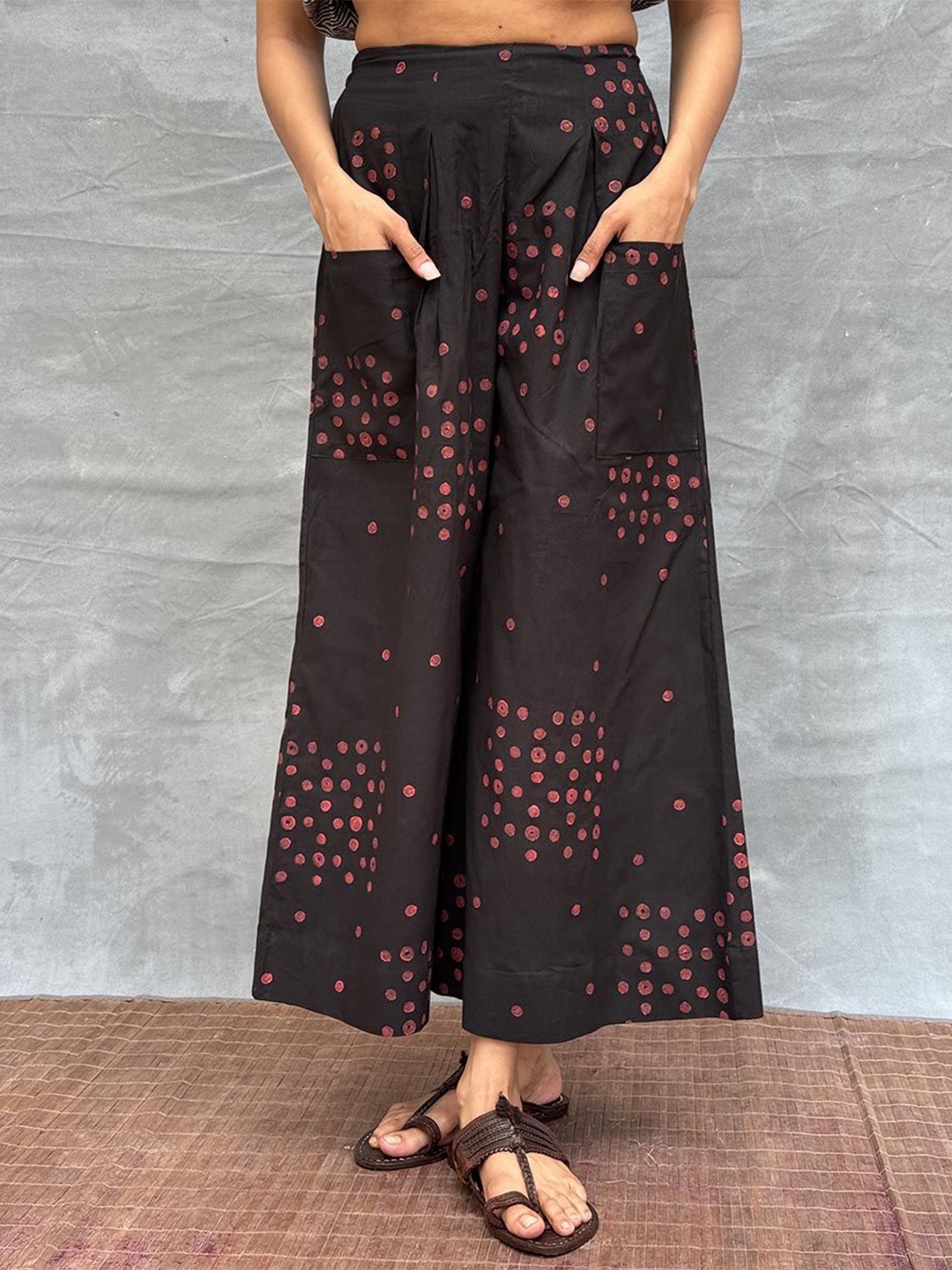 

Chidiyaa Women Soil Firelight Glow Blockprinted Cotton Ethnic Motifs Smart Flared Trousers, Black