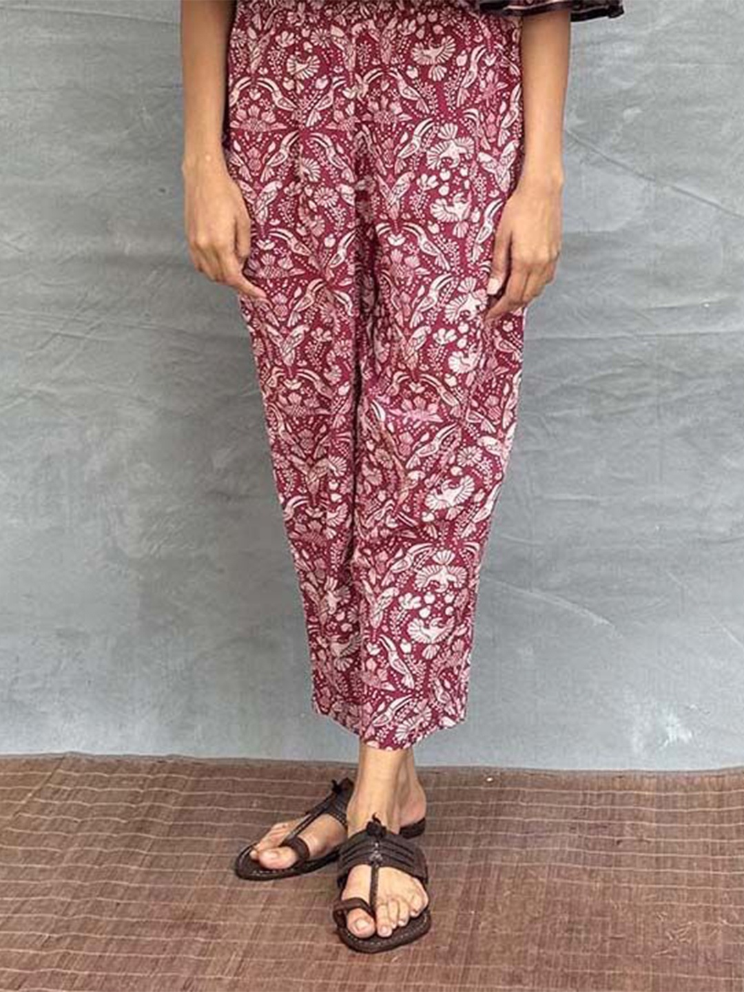 

Chidiyaa Women Ethnic Motifs Printed Smart Loose Fit Trousers, Maroon