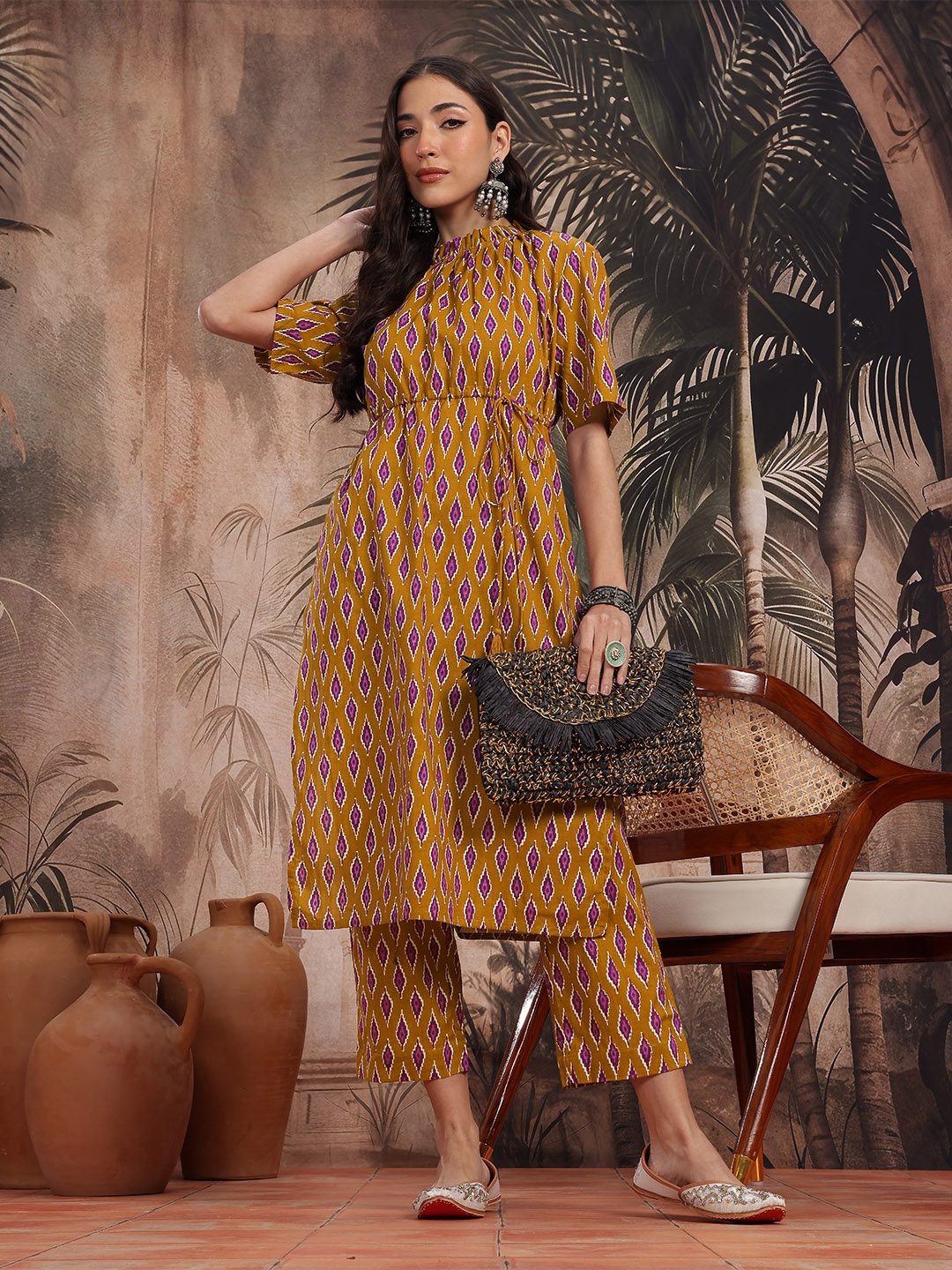 

Sangria Ikat Printed Empire Style Pure Cotton Straight Kurta with Trousers, Mustard