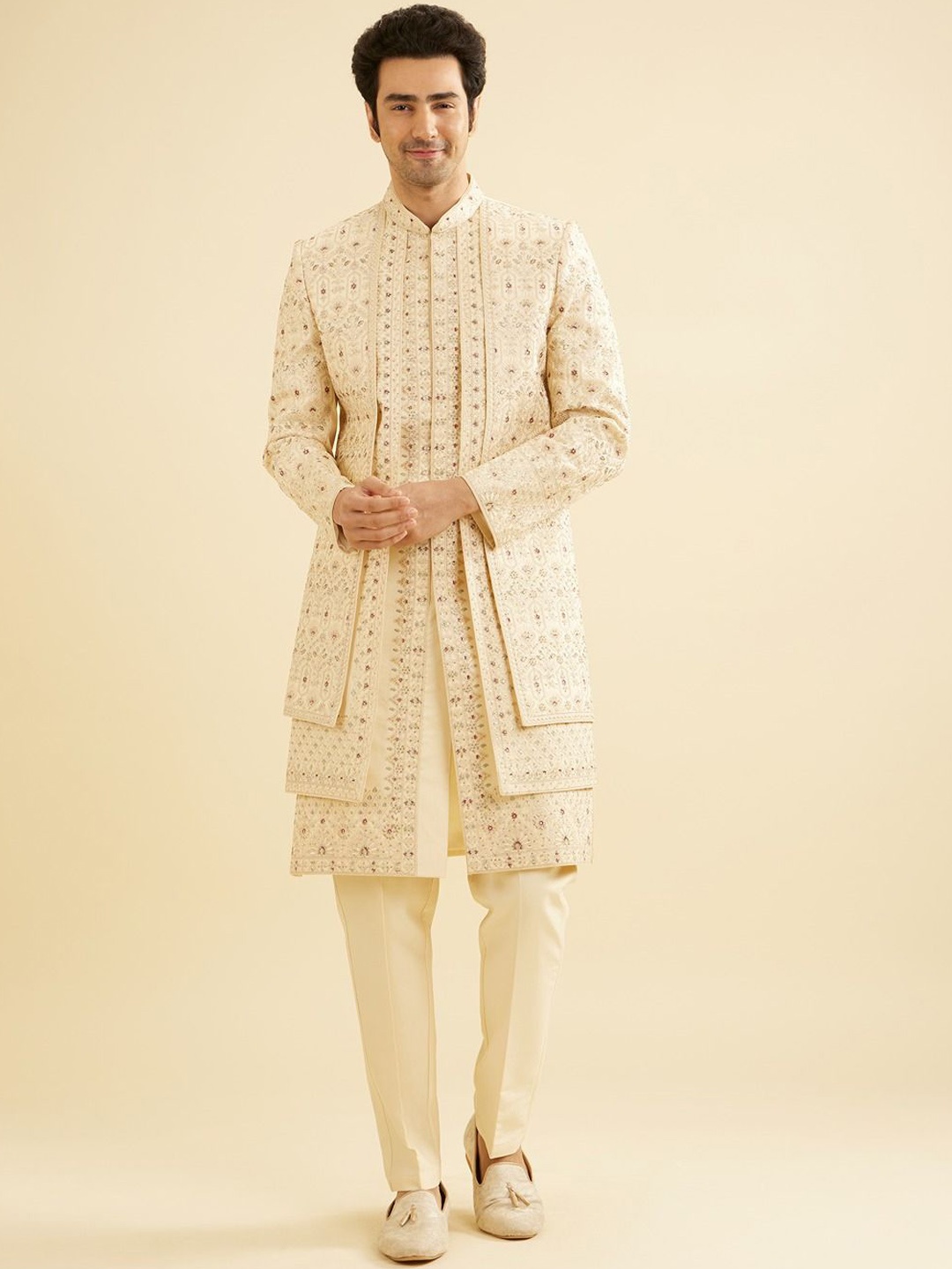 

Manyavar Men Mandarin Collar Thread & Stone Work Embroidered Sherwani Set, Beige